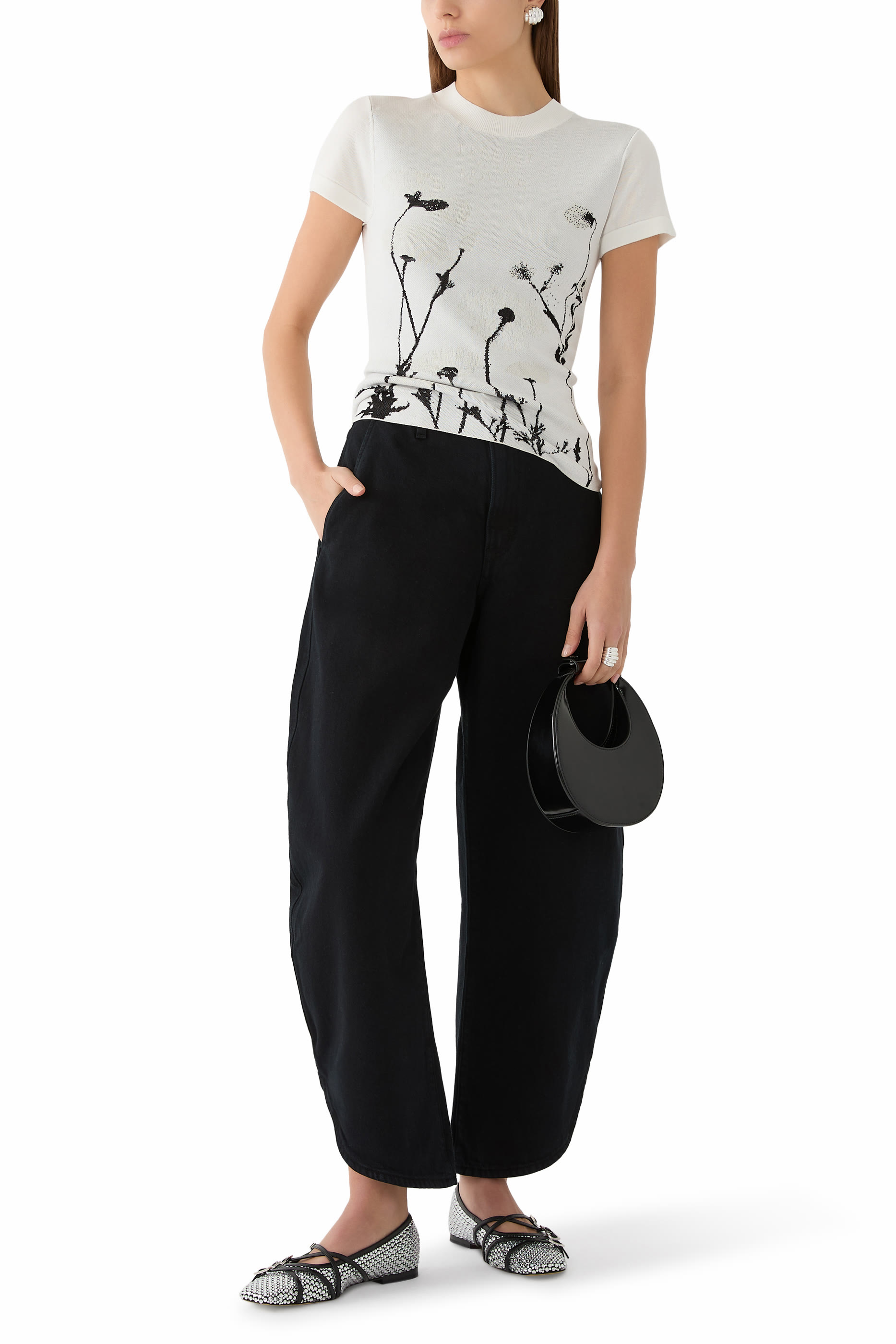 تيشيرت بلانكا بنقشة زهور تتفاعل مع الأشعة فوق البنفسجية