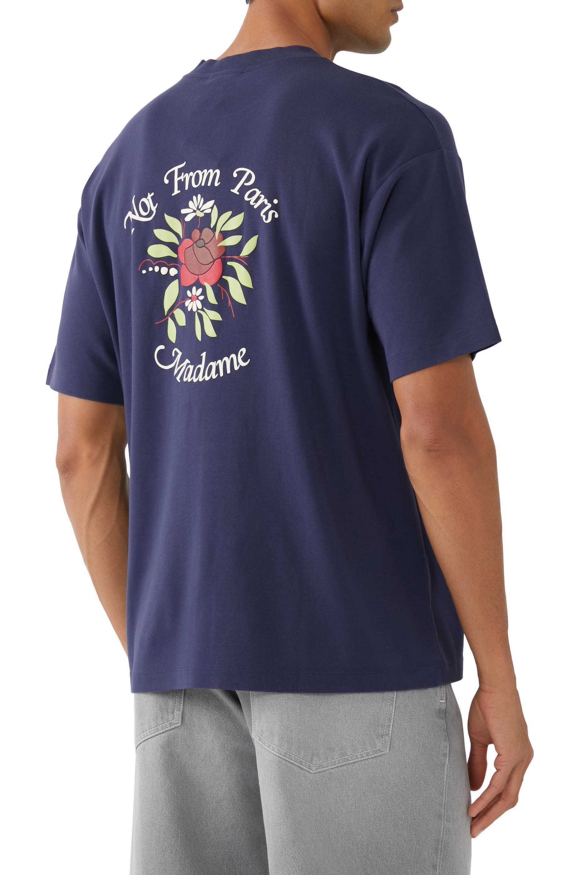 تيشيرت بنقشة زهرة وعبارة نصية