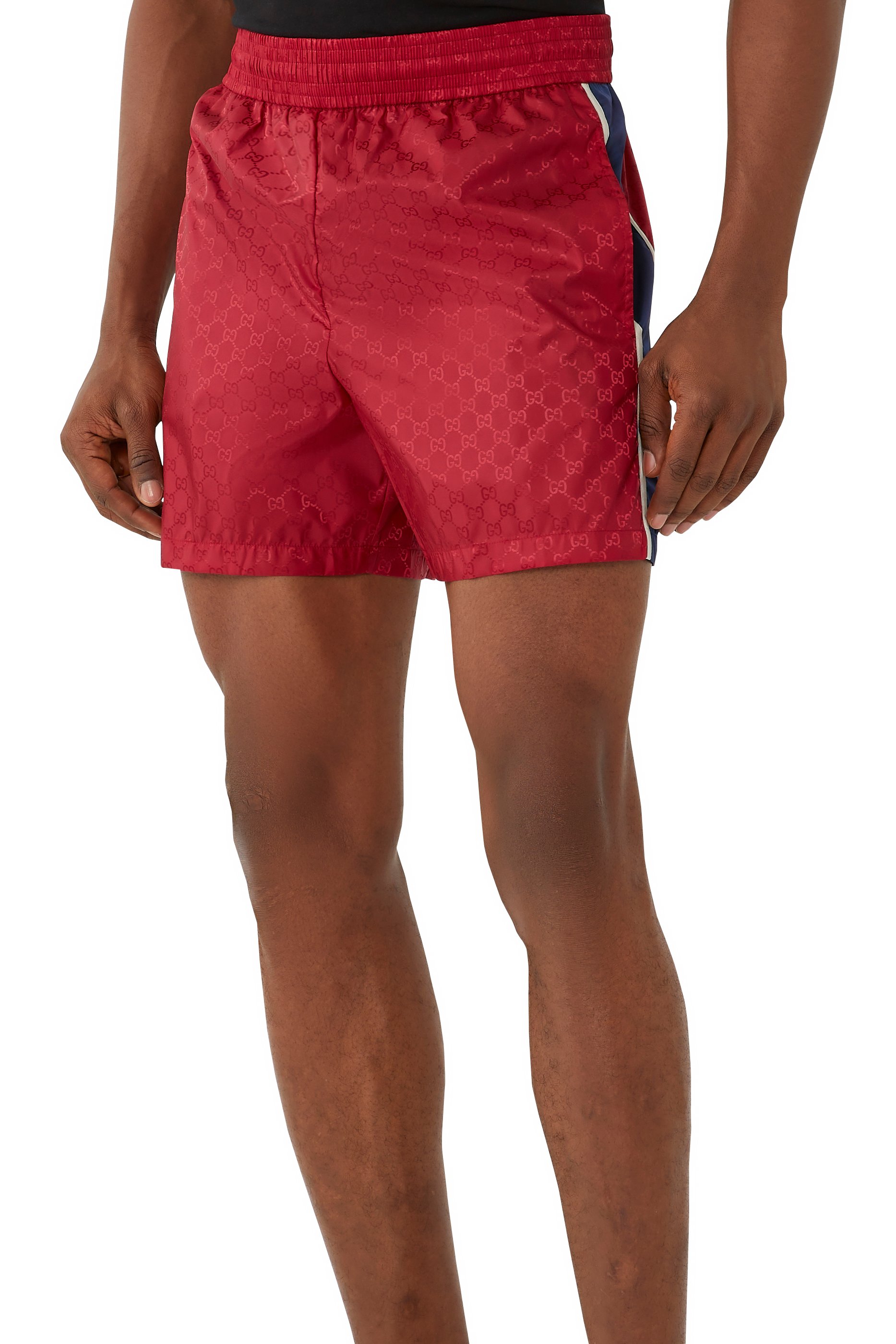 شورت سباحة مخطط بحرفي شعار الماركة