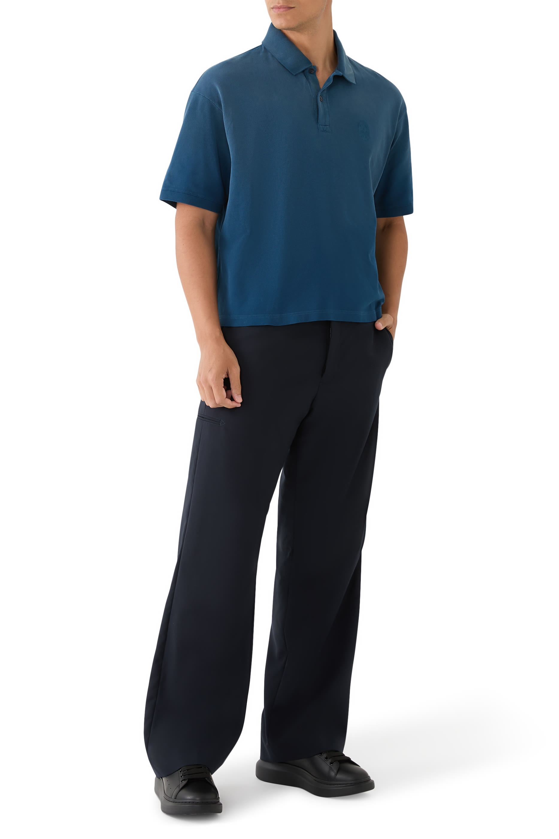 قميص بولو باهت بشعار الماركة