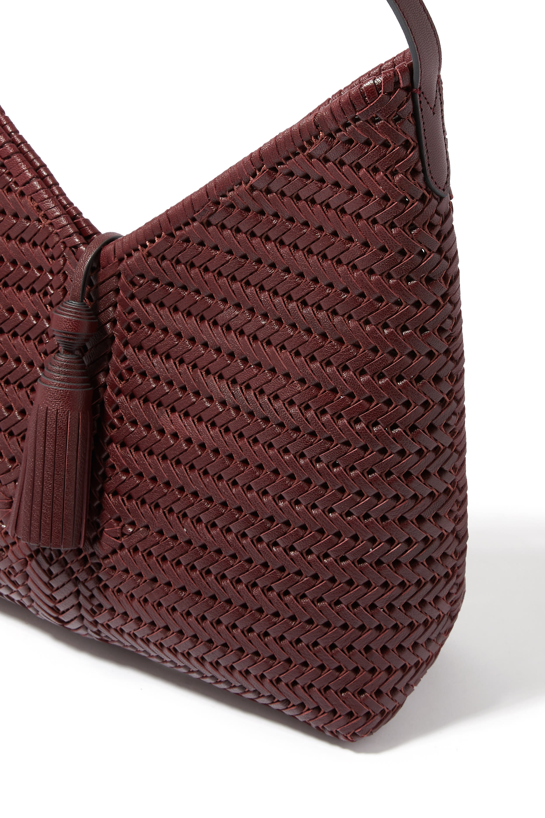 حقيبة هوبو نيسون مزينة بشرابات