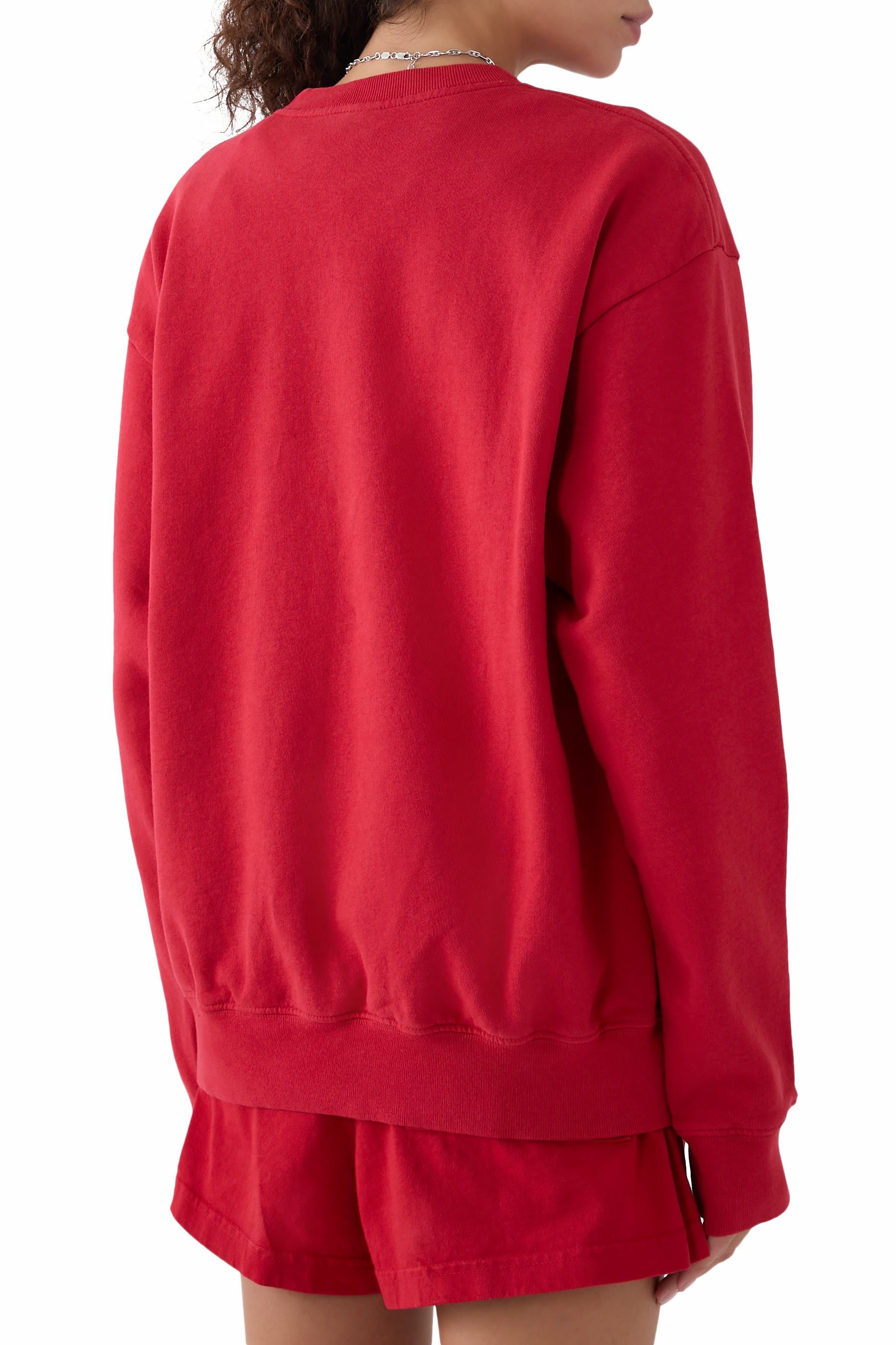 سويت شيرت بياقة ضيقة ونقشة شعار الماركة بتصميم جامعي