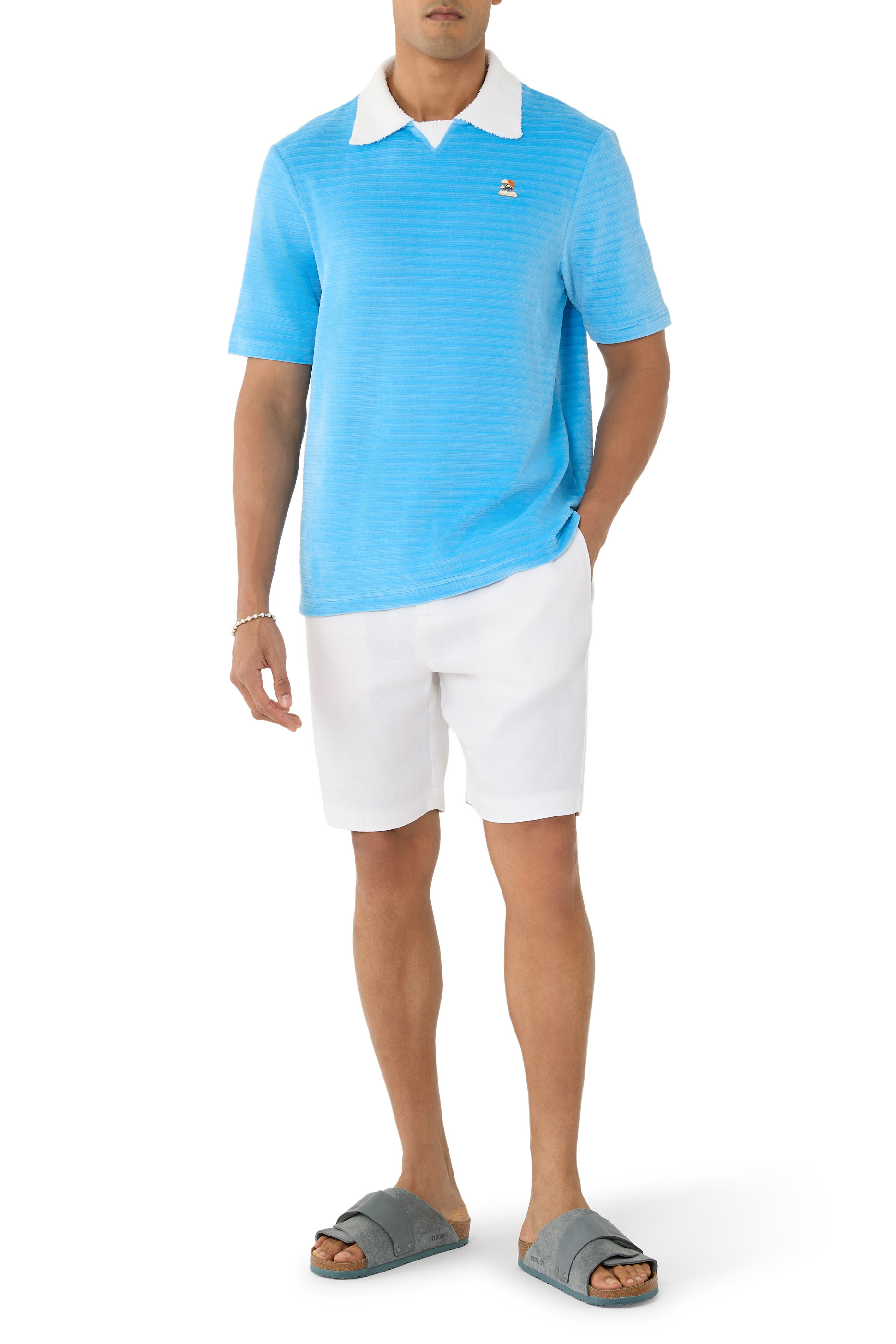 قميص بولو بأكمام قصيرة مخمل