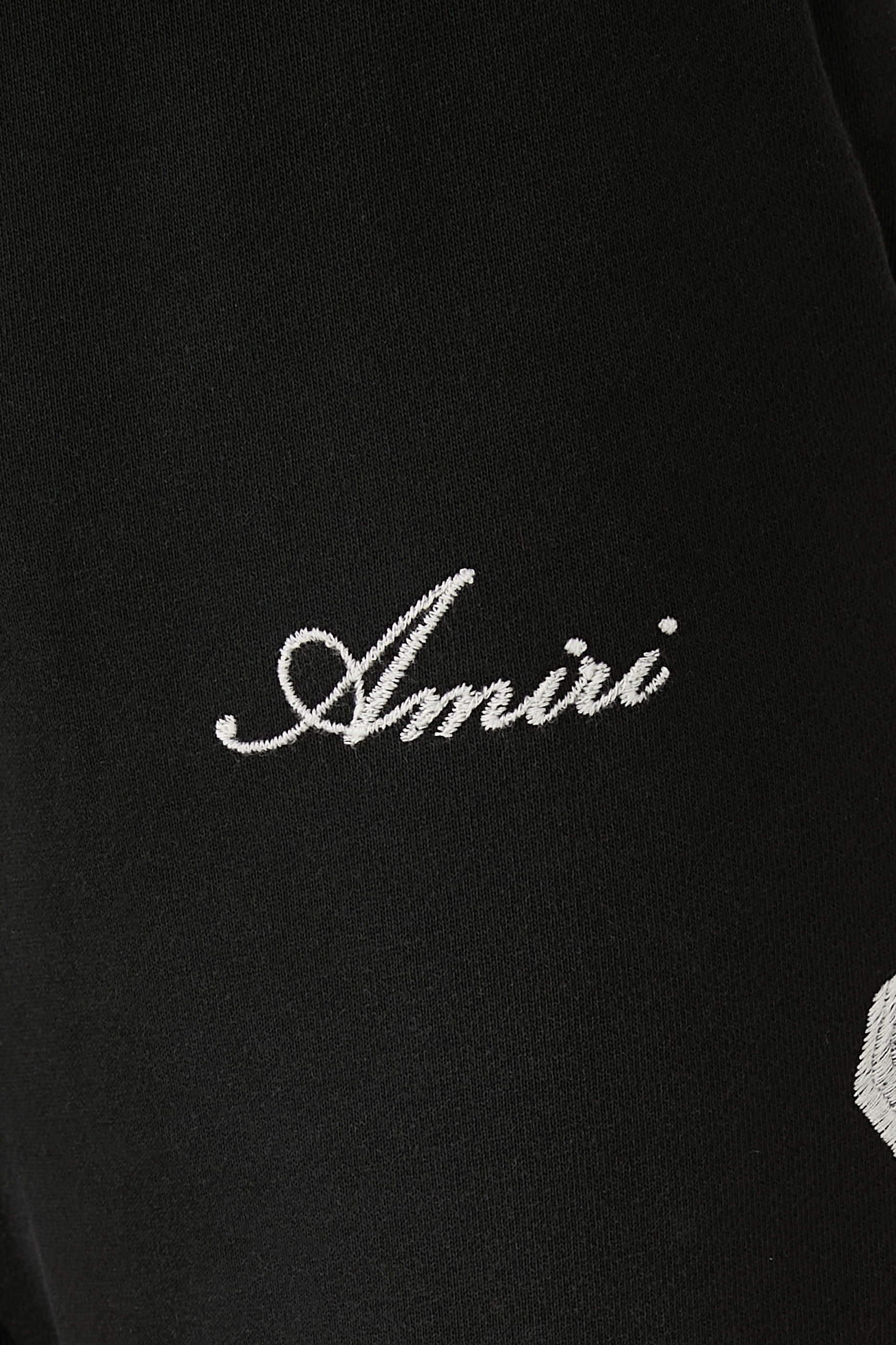 بنطال رياضي بقصة فضفاضة ورقع هيكل عظمي