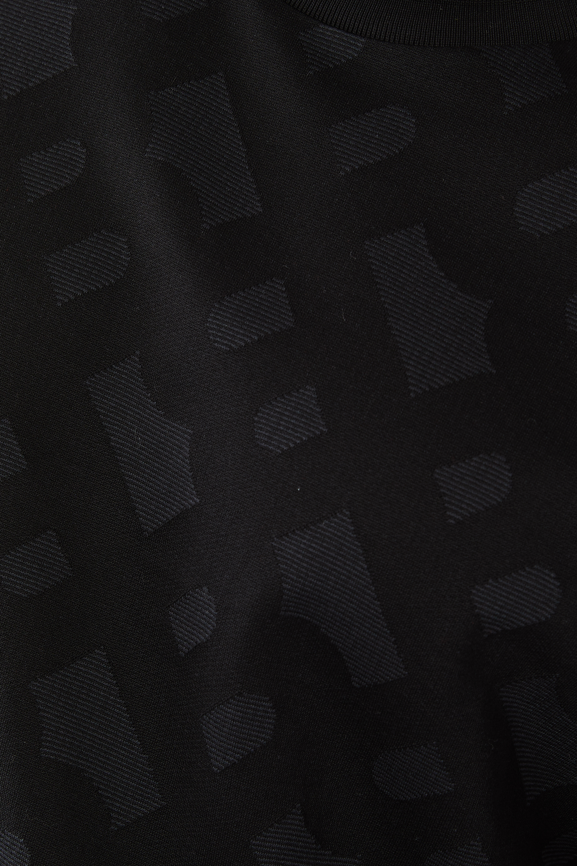 تيشيرت تريبوت بحروف شعار الماركة &nbsp;