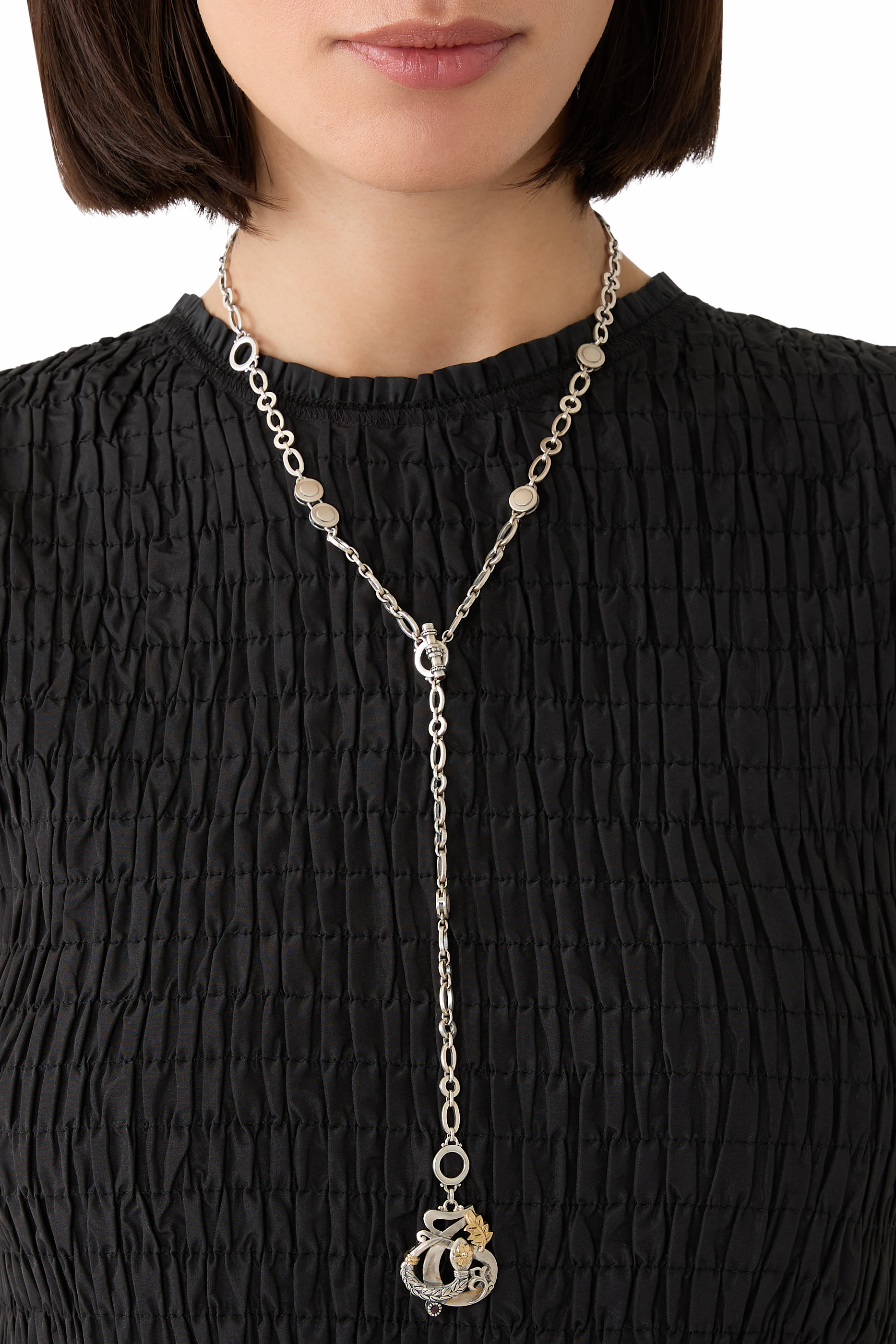 قلادة لوف اند ريبيرث متعددة الاستخدامات مرصعة بحجر الرودولايت، الغارنيت أو الفيروز، ذهب عيار 18، وفضة استرلينية.