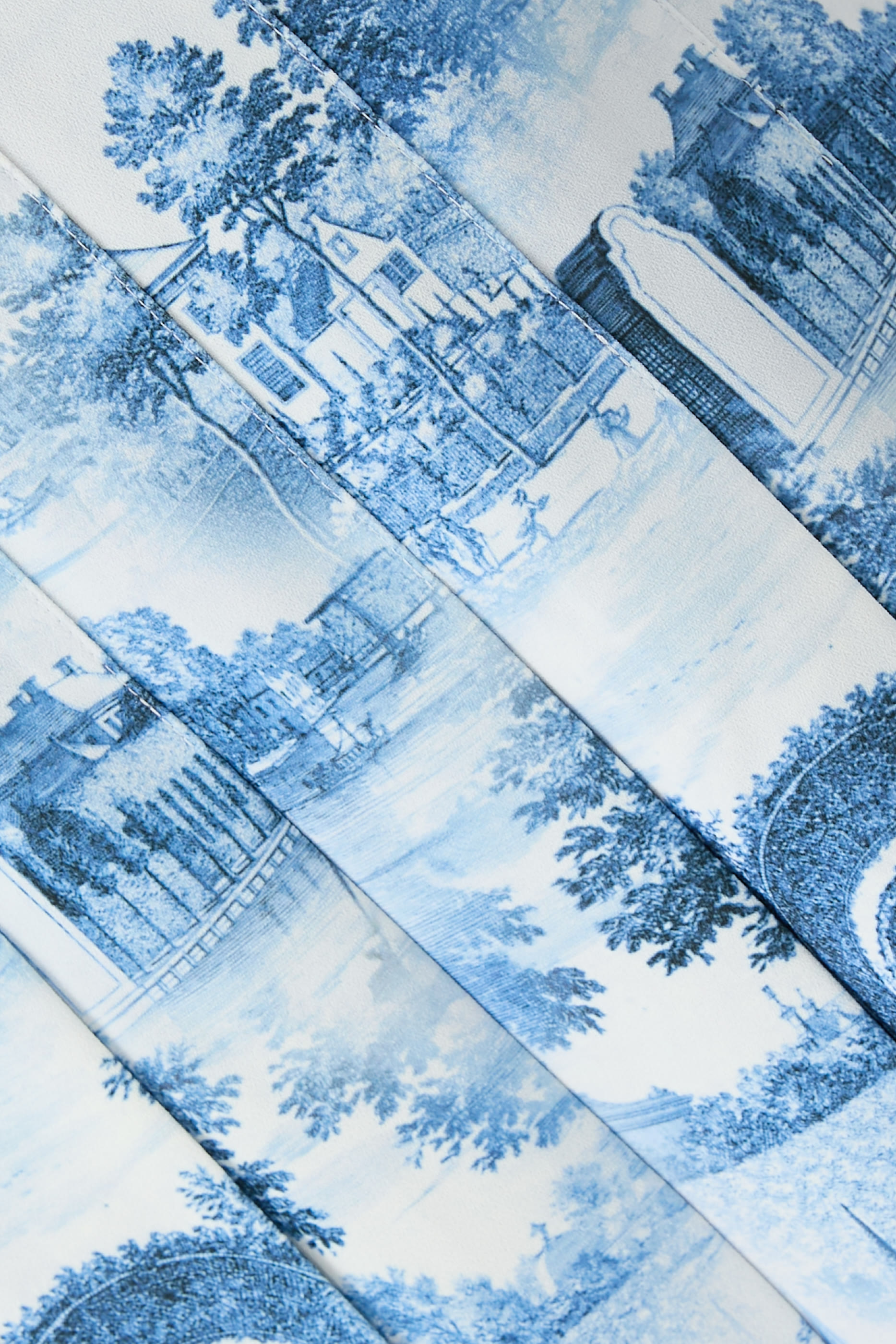 تنورة كارتر قصيرة بطيات وحياكة