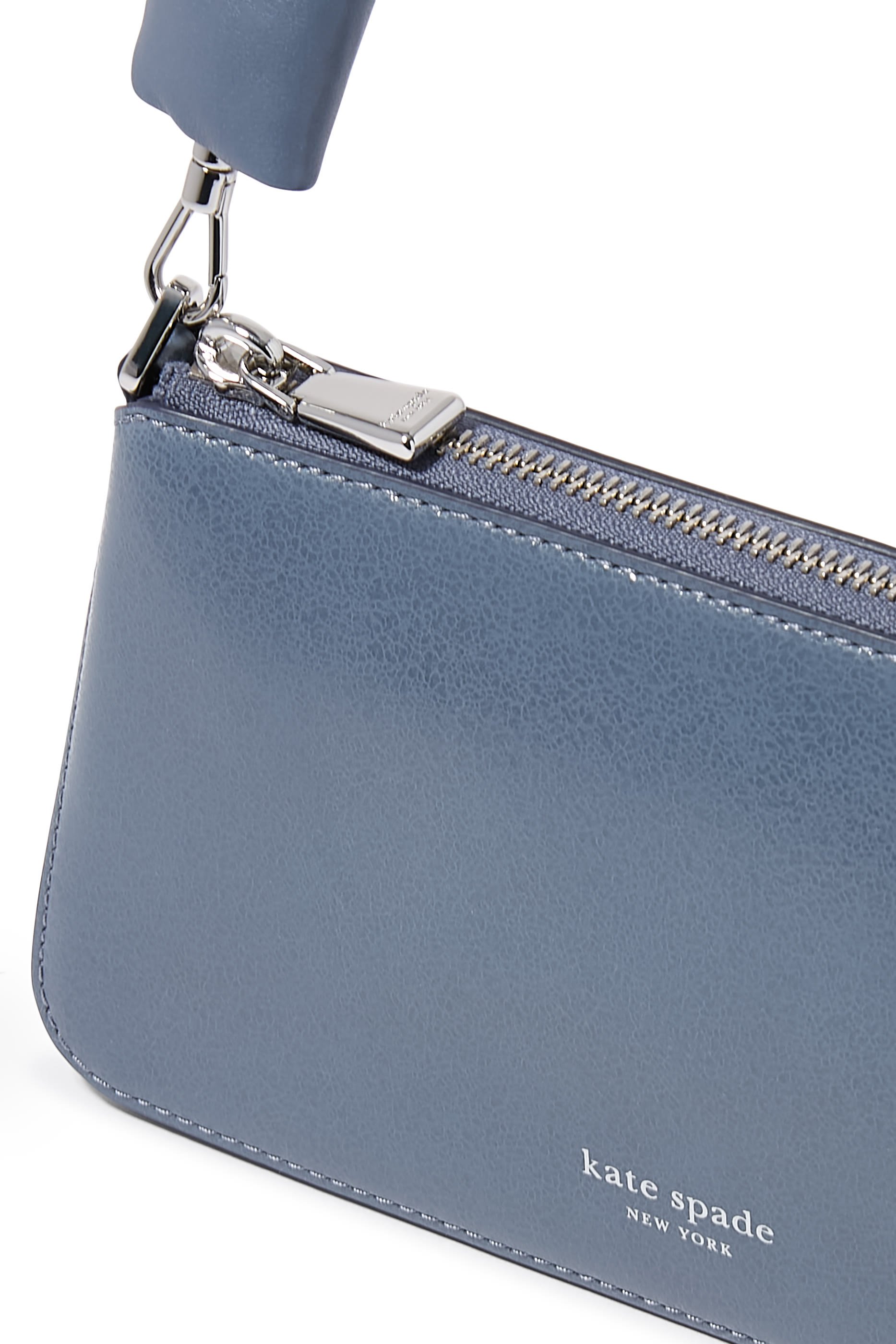 حقيبة بشعار الماركة جلد