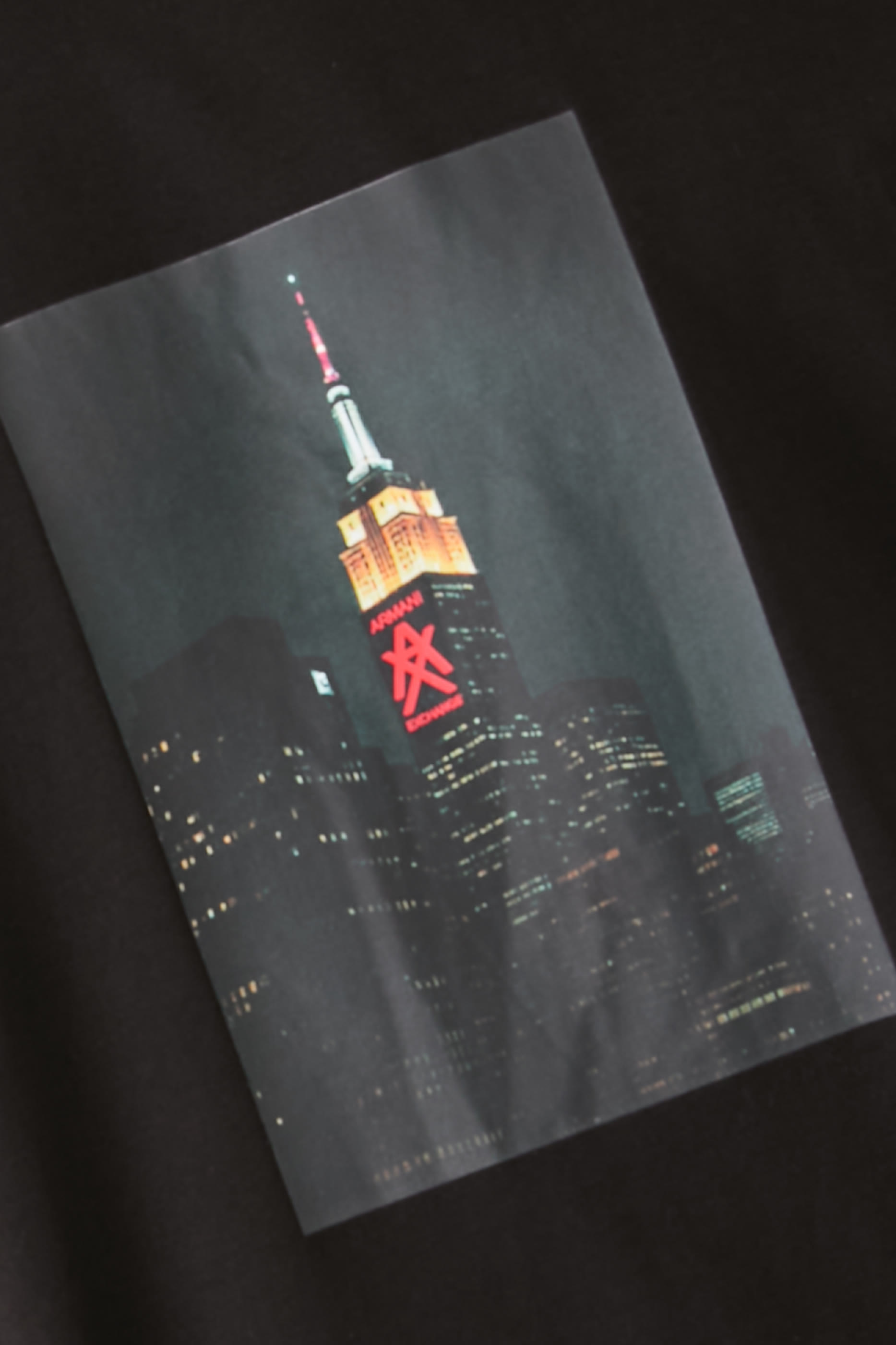 تيشيرت بشعار حرفي الماركة