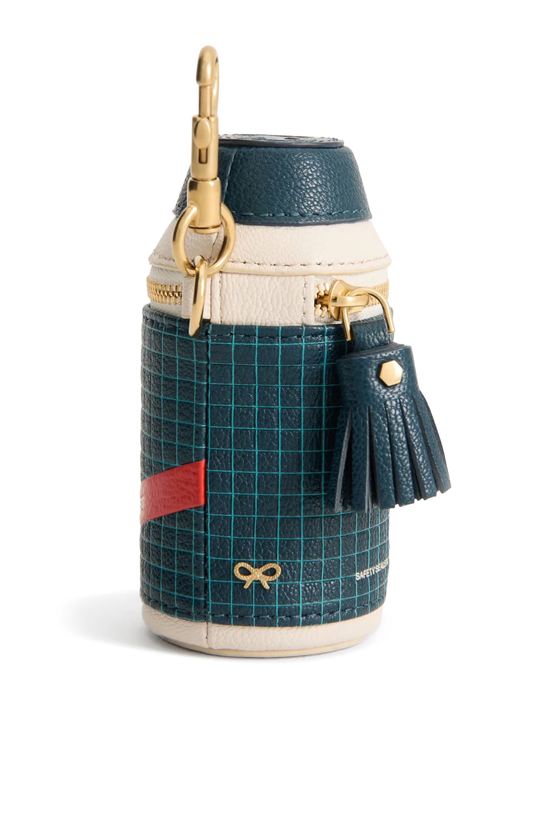 حافظة عملات معدنية أنيا براندز بتصميم علبة دواء أدفيل