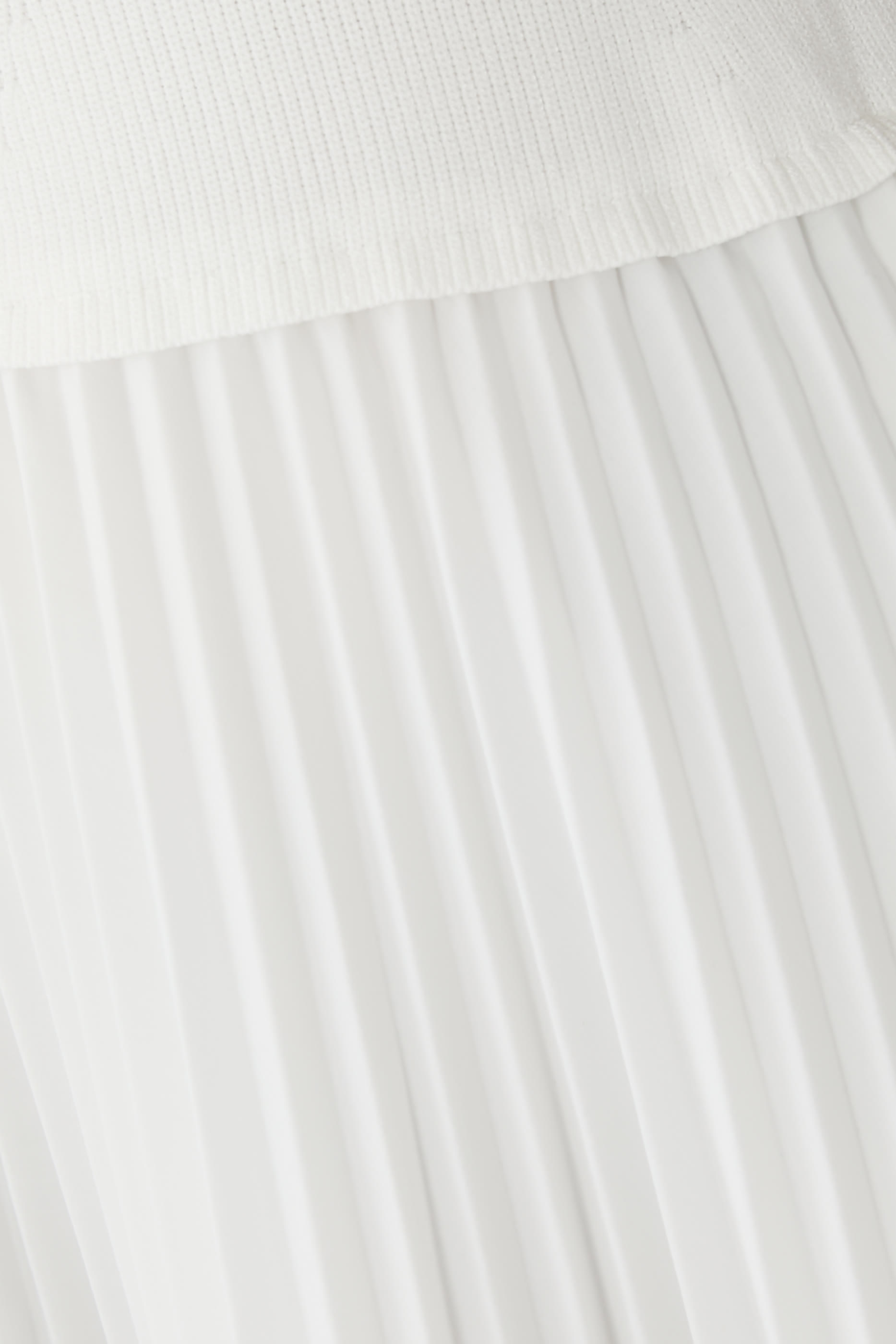 تنورة ستيلا بطيّات بحزام محاك