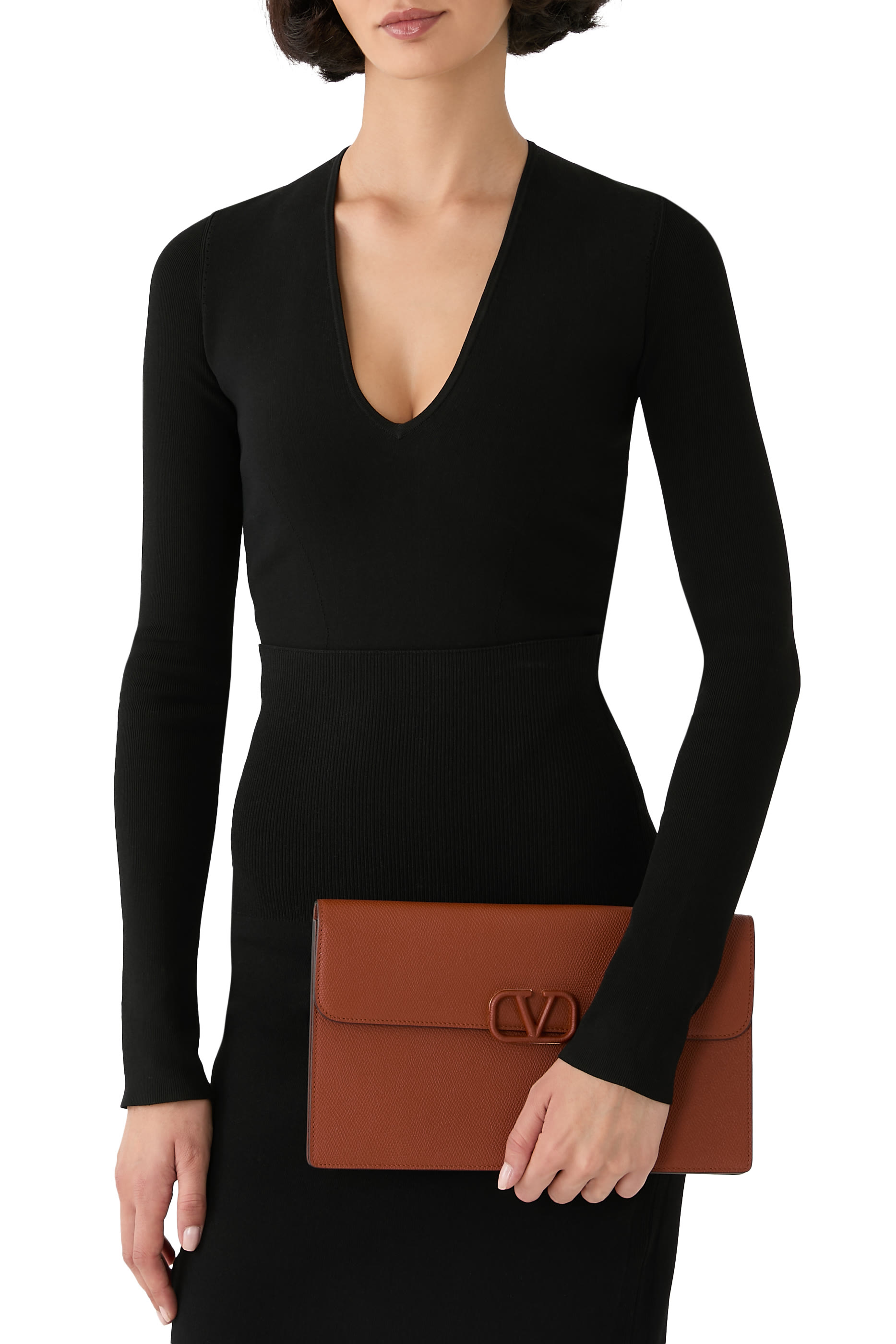 حقيبة صغيرة بشعار الماركة