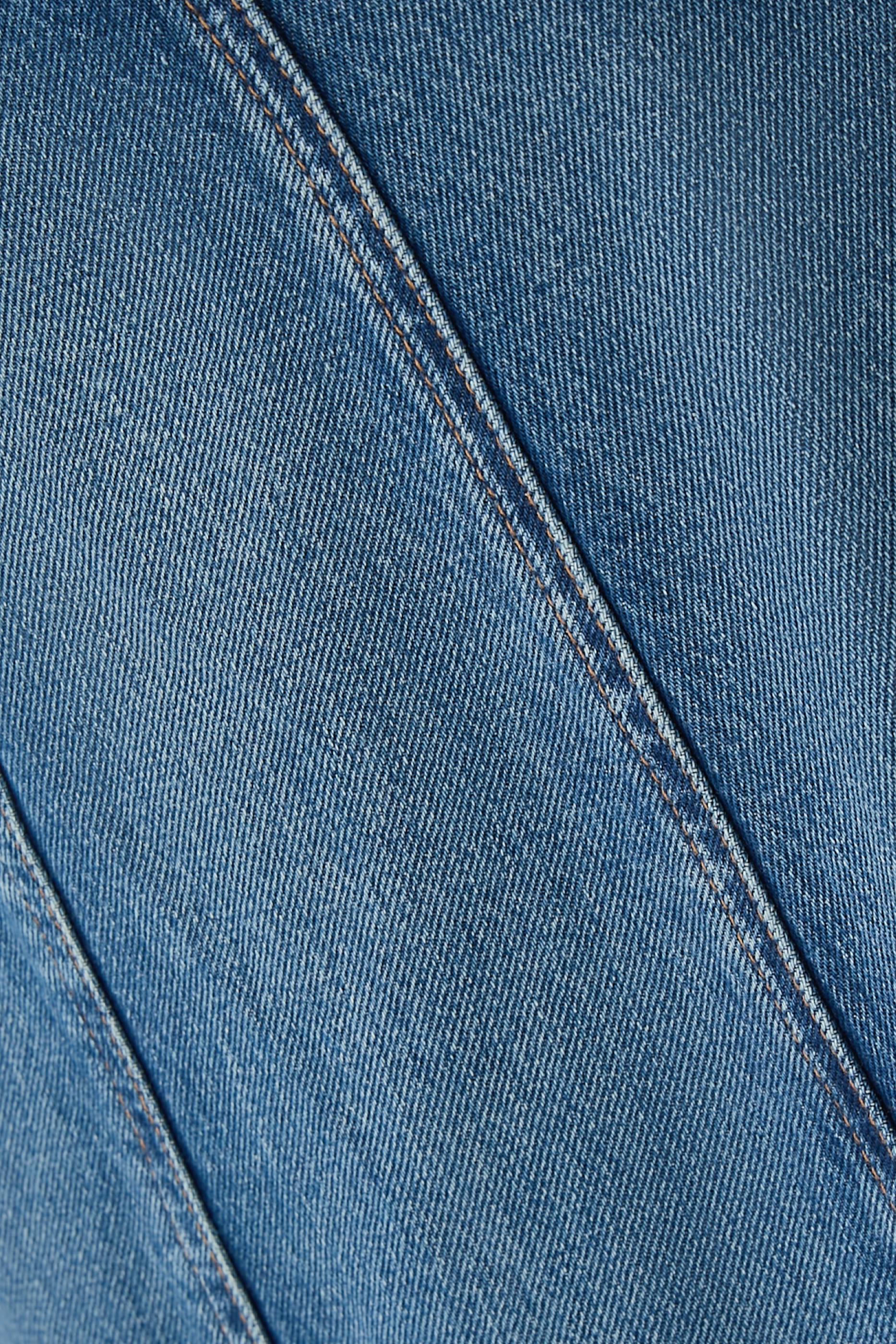 حقيبة بيد علوية وإغلاق على شكل حرف T