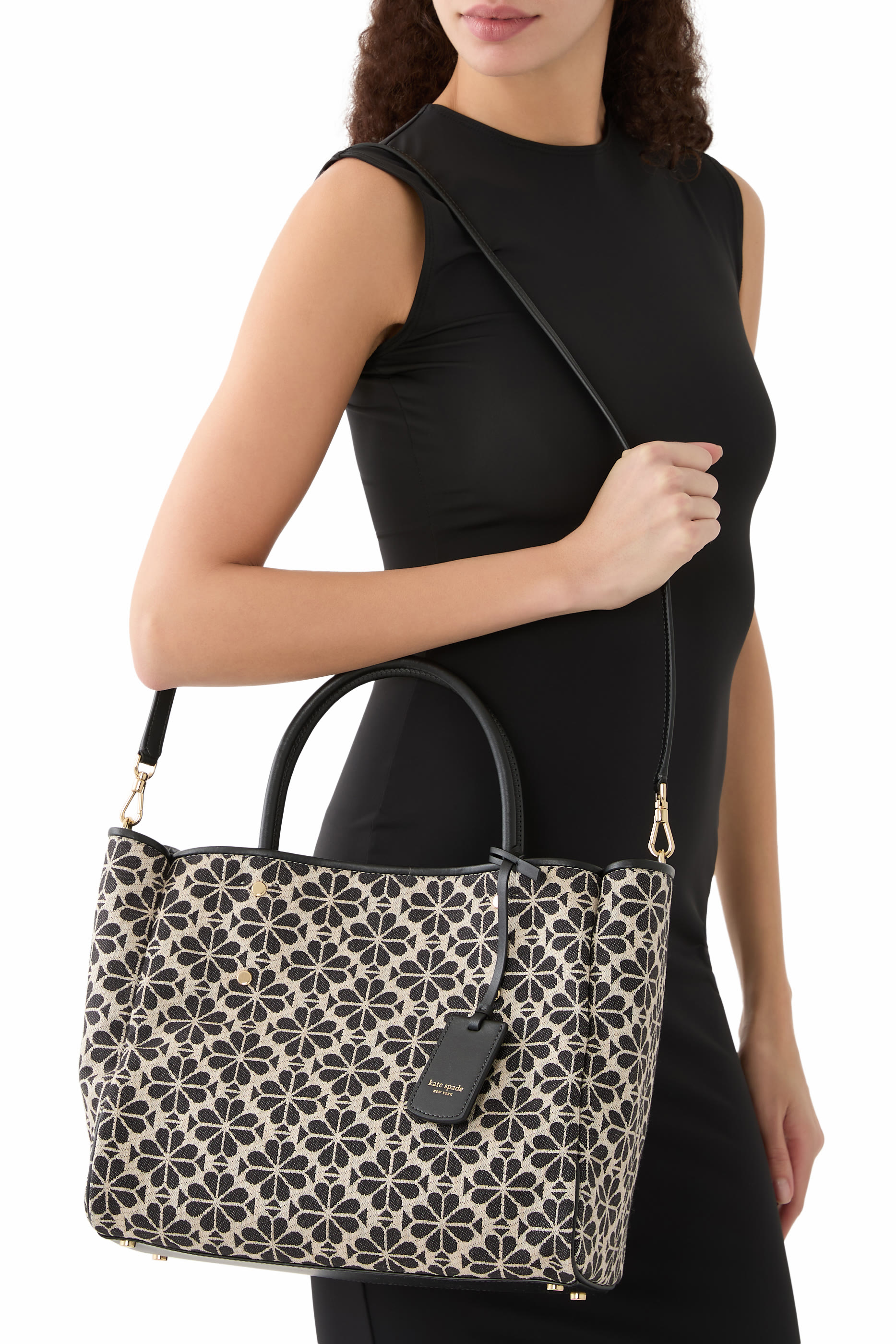 حقيبة يد متوسطة بنقشة زهور بالشكل البستوني