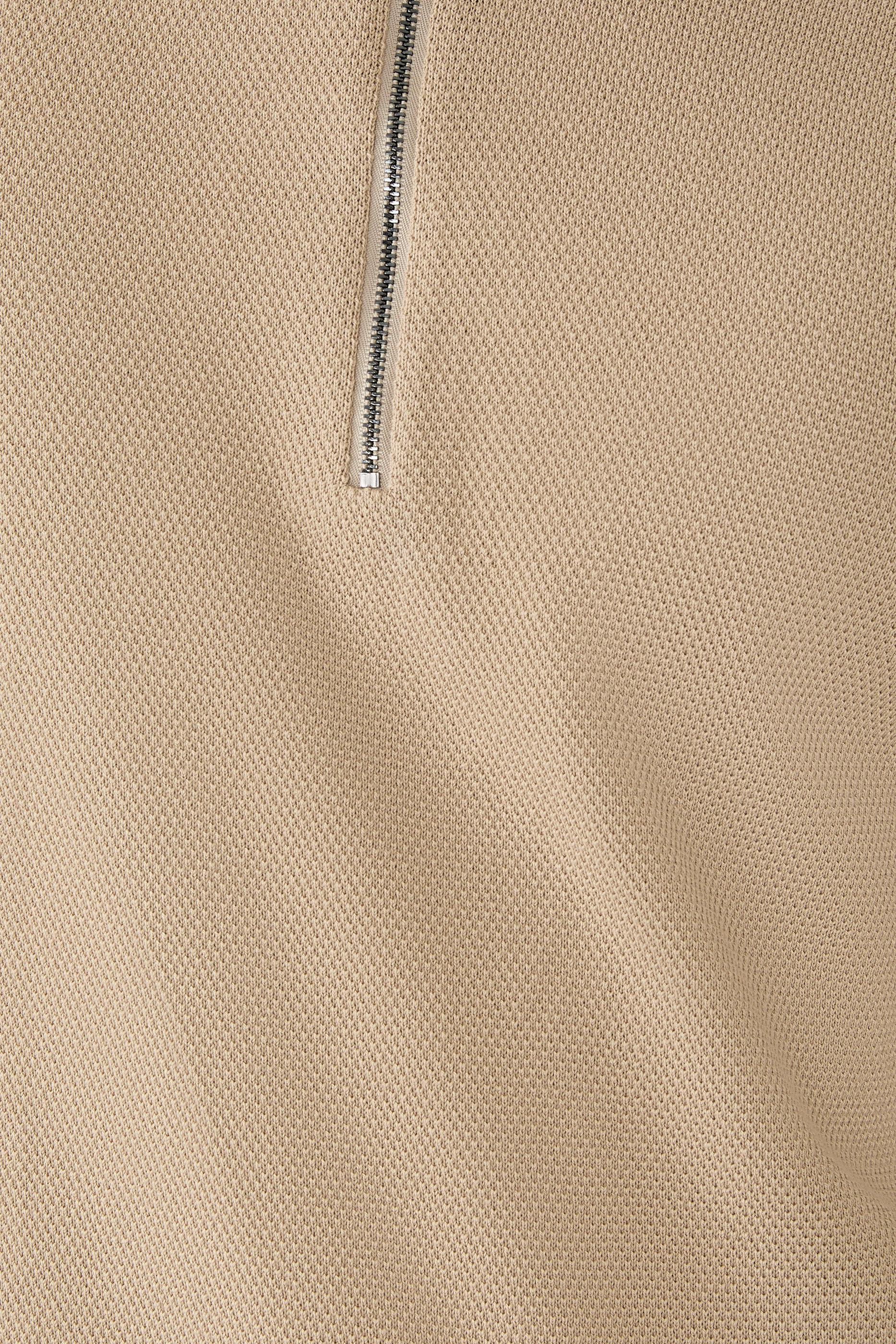 كنزة إبراندو بياقة بسحاب