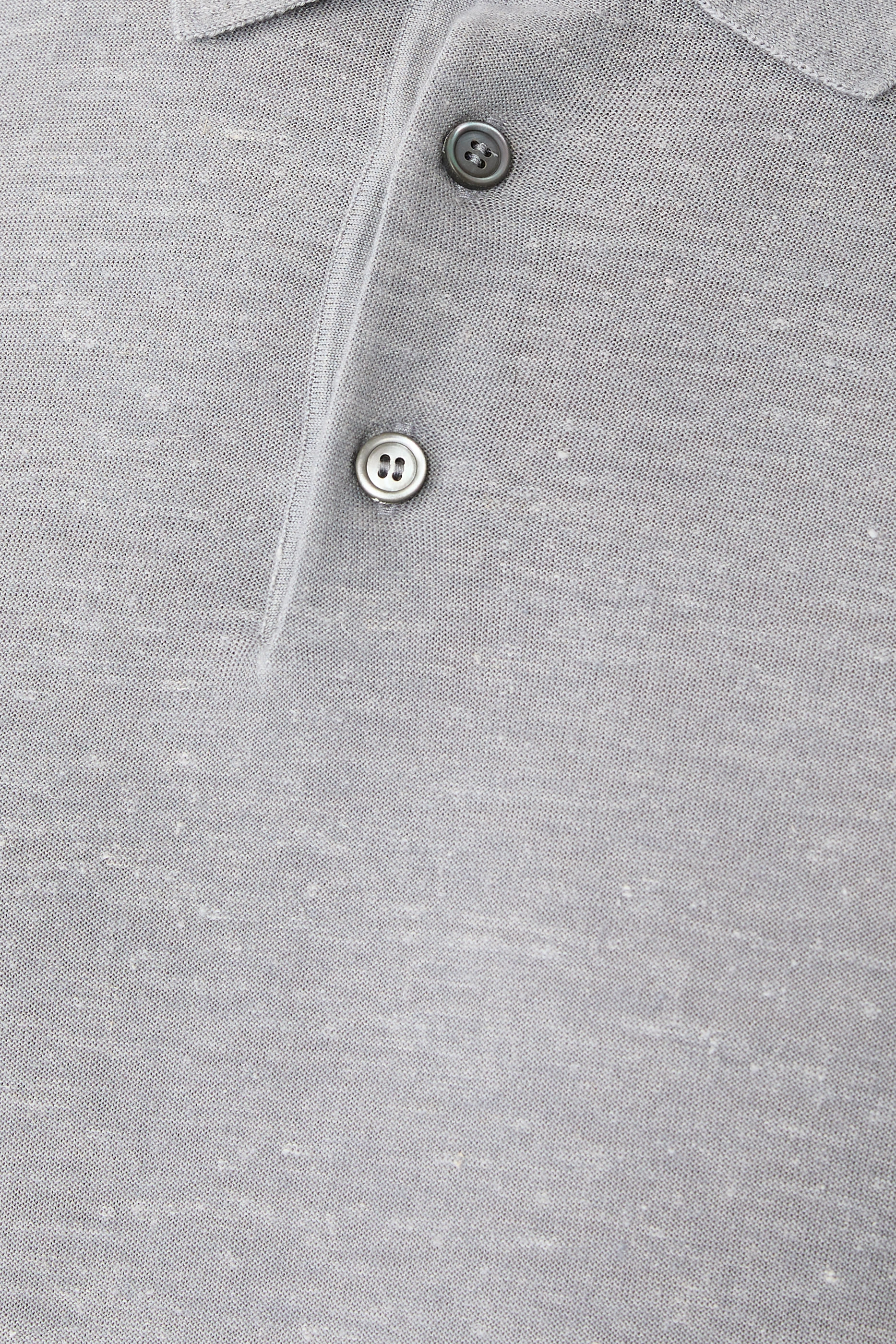 قميص بولو بأكمام قصيرة