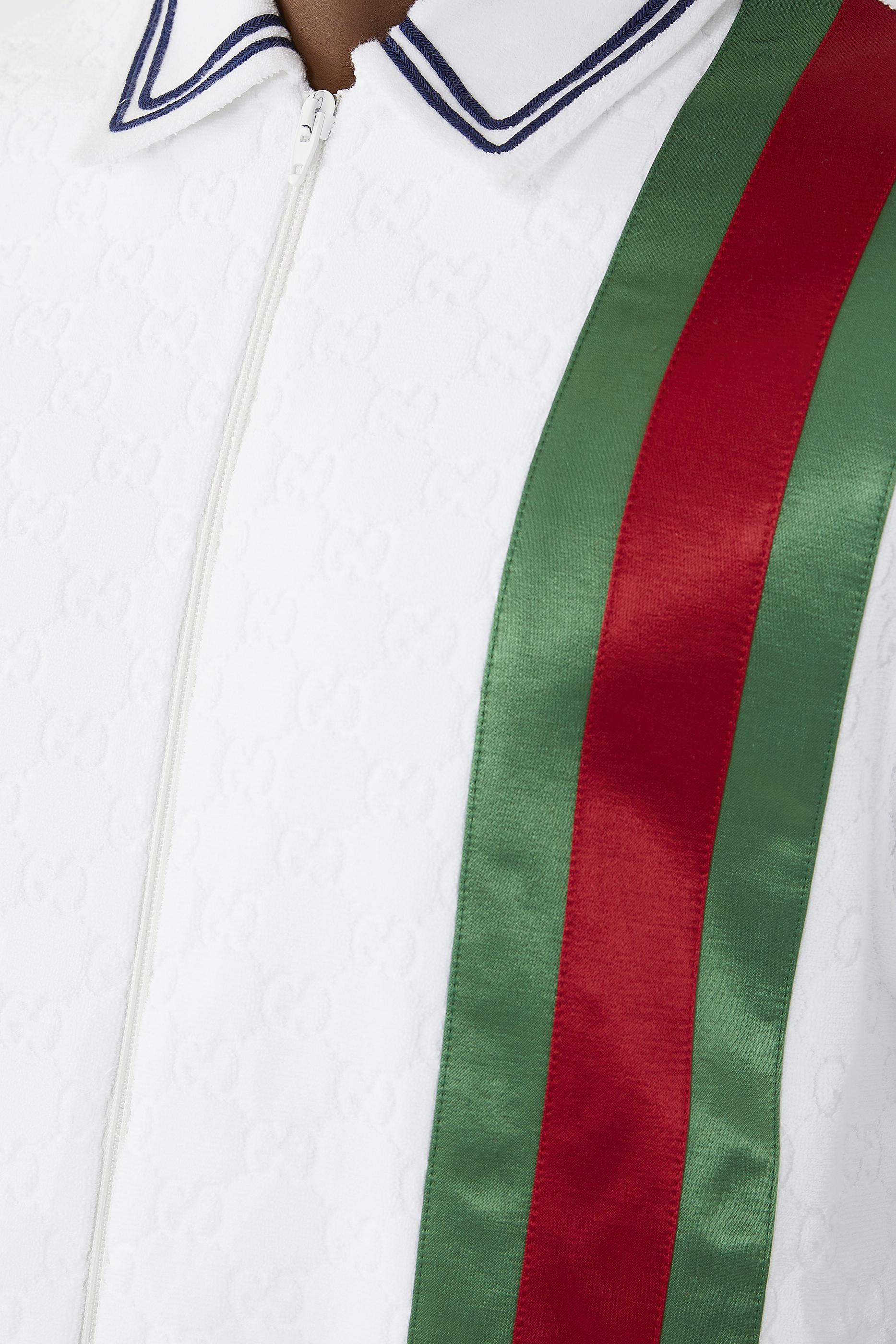 قميص بولو بشريط ويأبيض