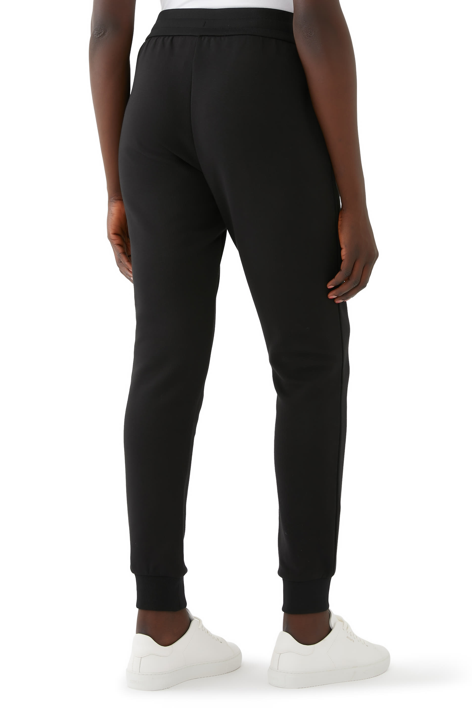 بنطال رياضي بحروف شعار الماركة بإصدار للسنة الصينية الجديدة