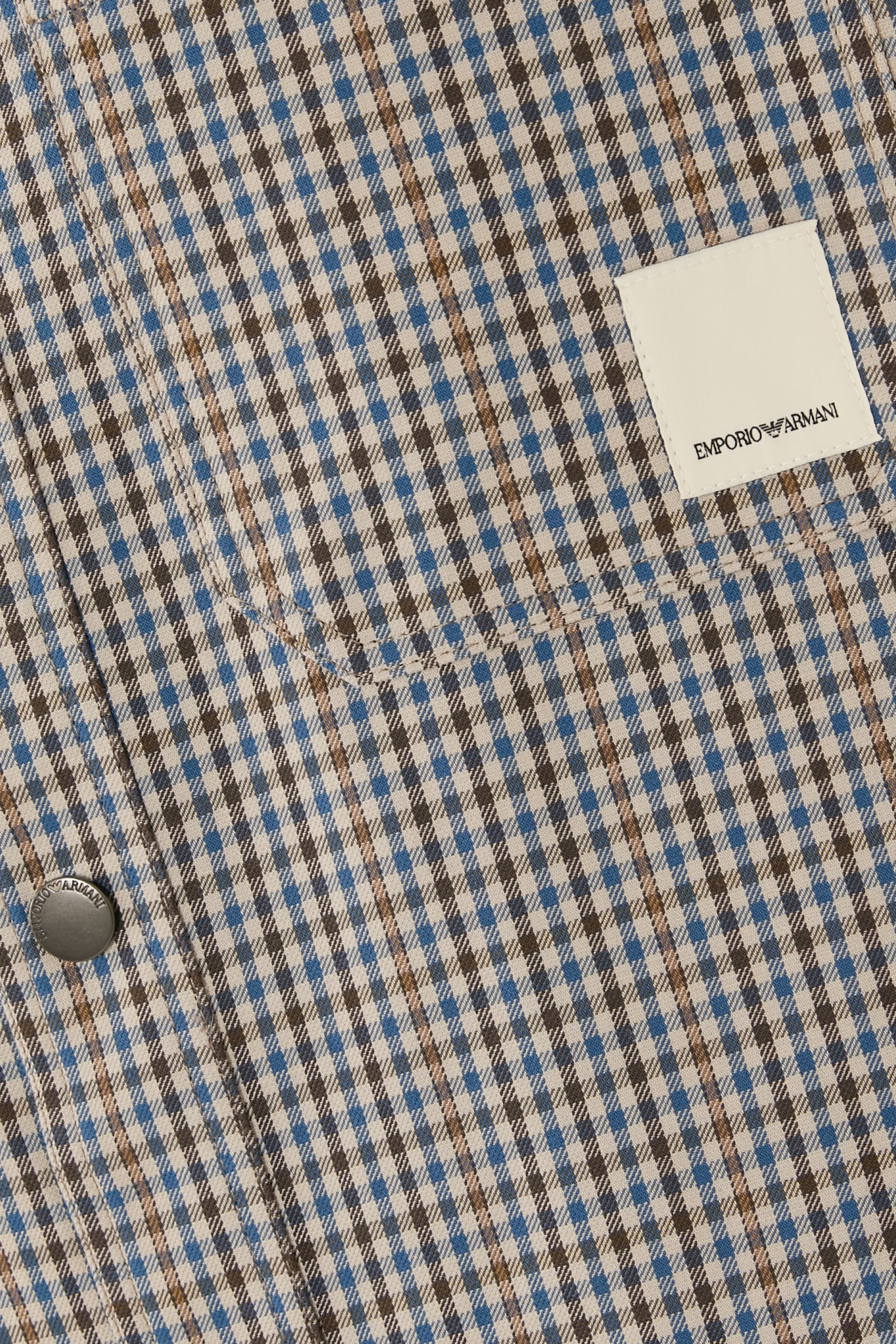 جاكيت بتصميم بوجهين بنقشة مربعات وشعار الماركة