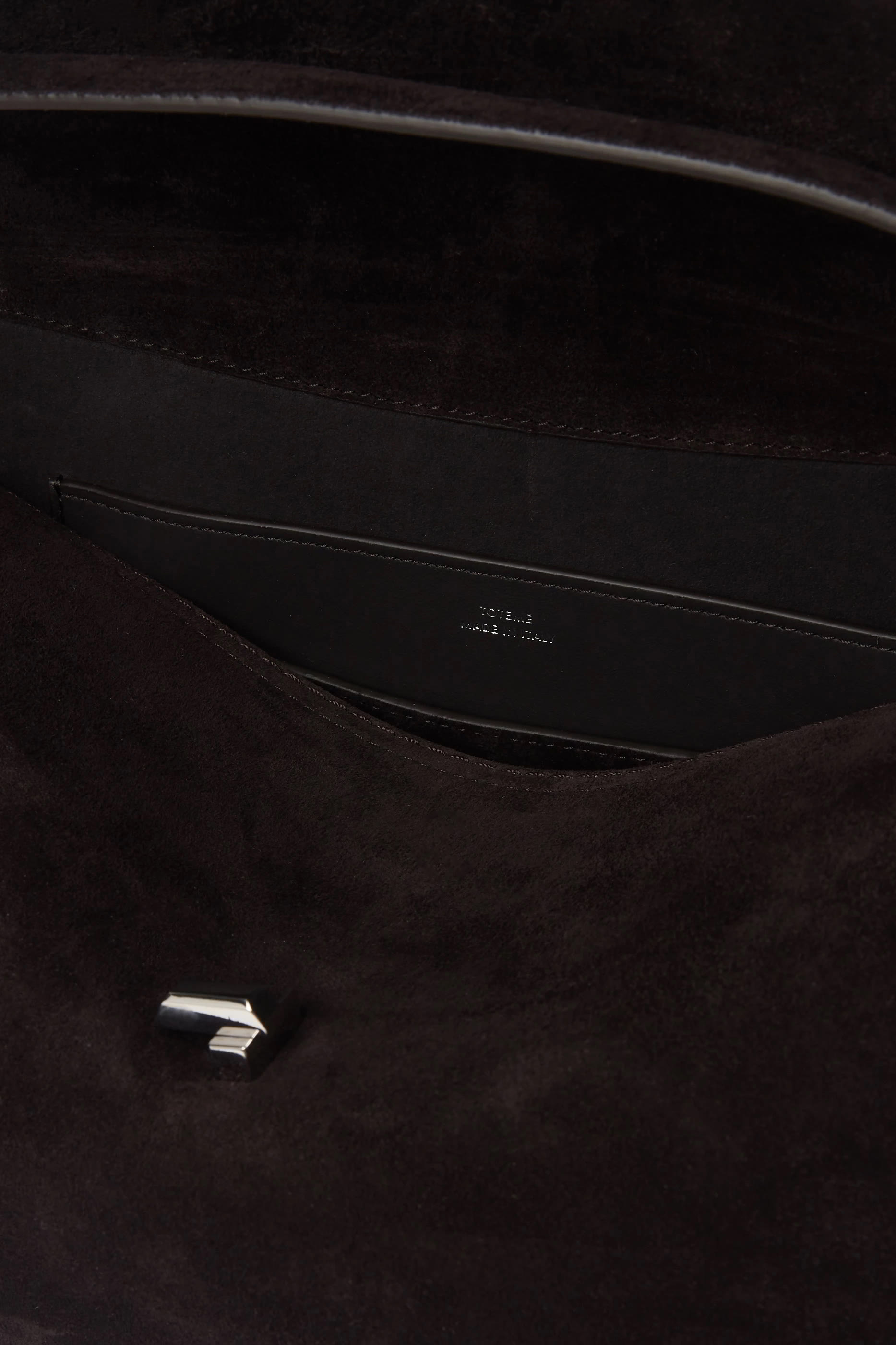 حقيبة بيد علوية وقفل بتصميم حرف T شمواه