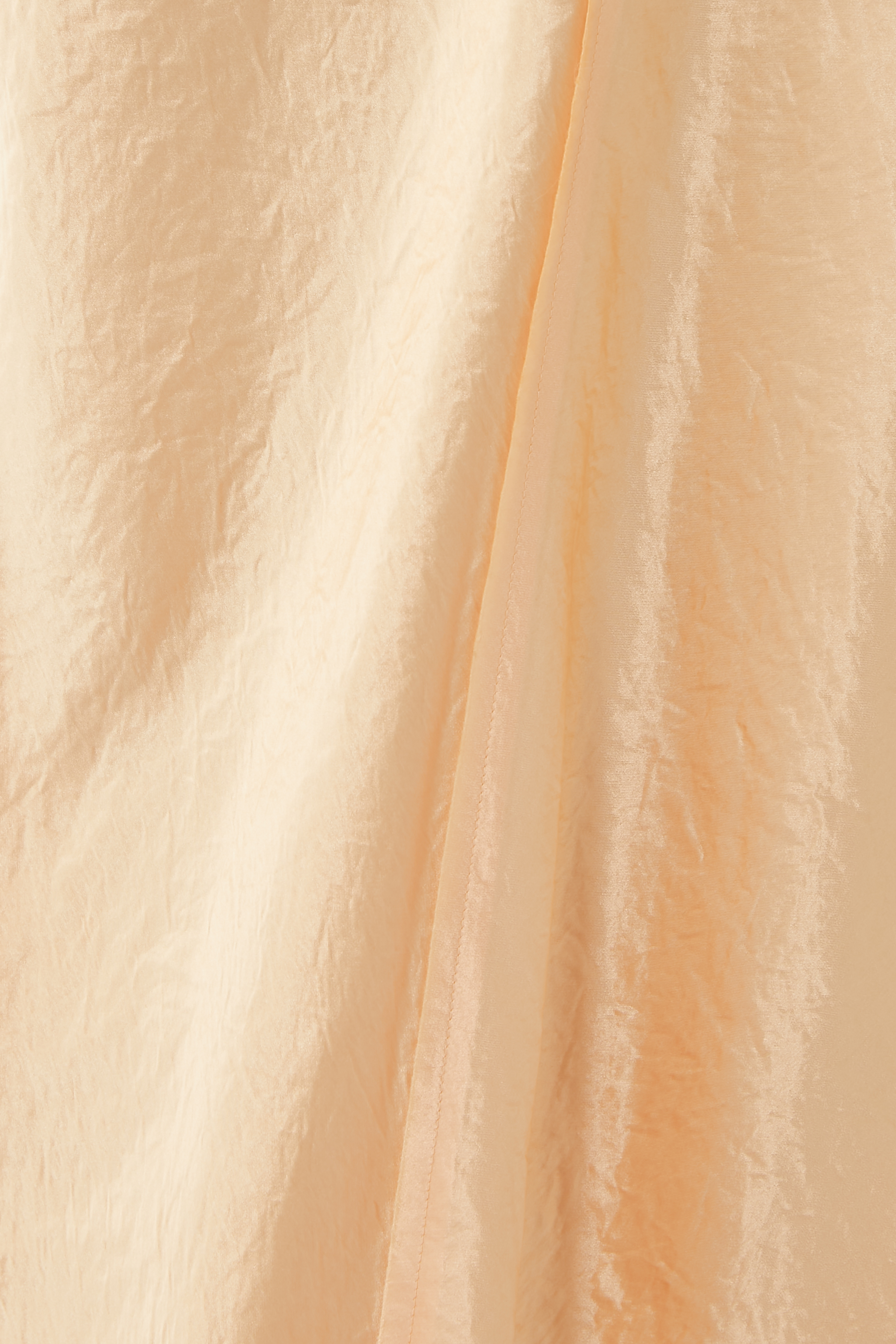 تنورة سهل الإرتداء متوسطة الطول بحافة منسلة وتصميم مقسم بأجزاء