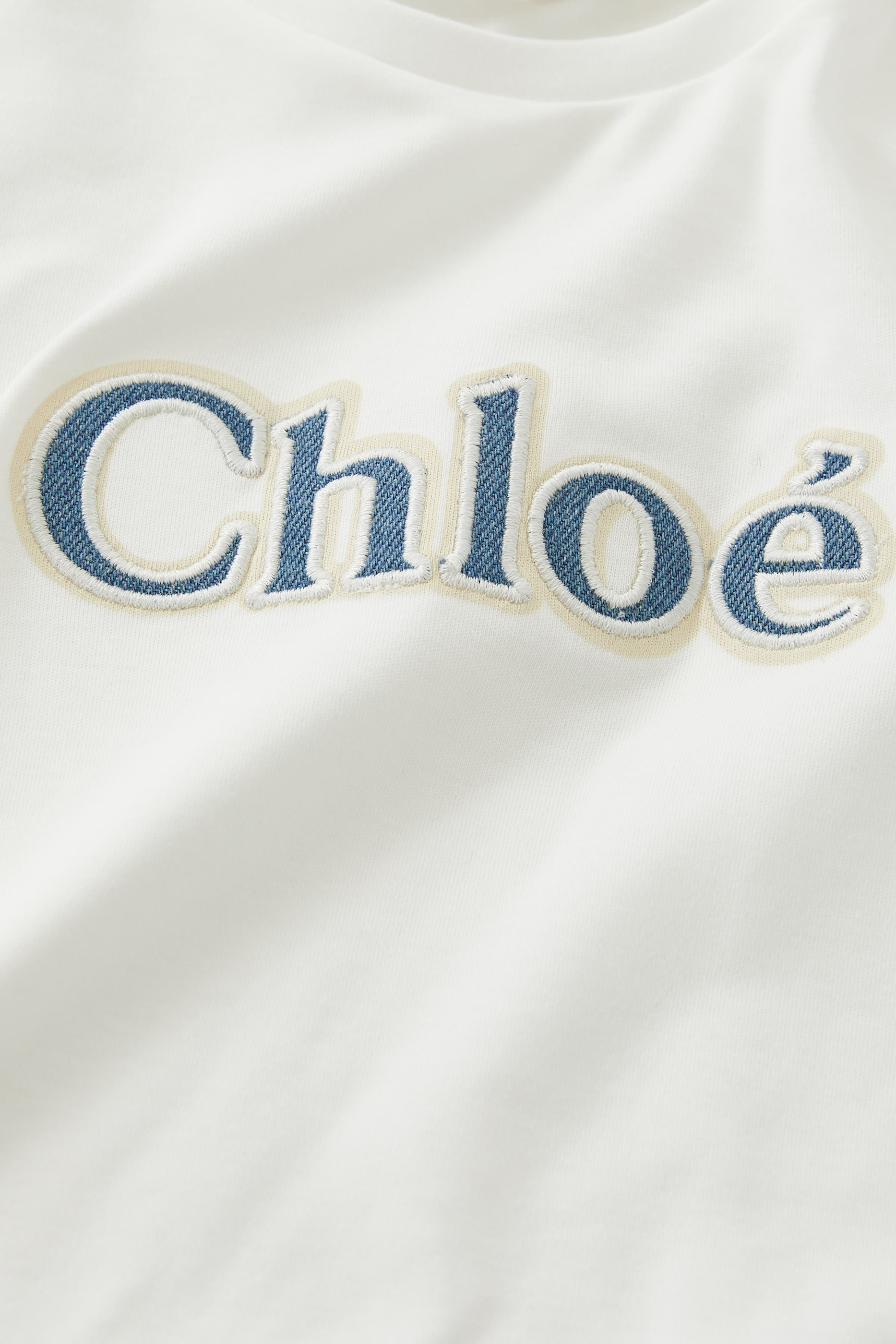 تيشيرت بشعار الماركة للأطفال