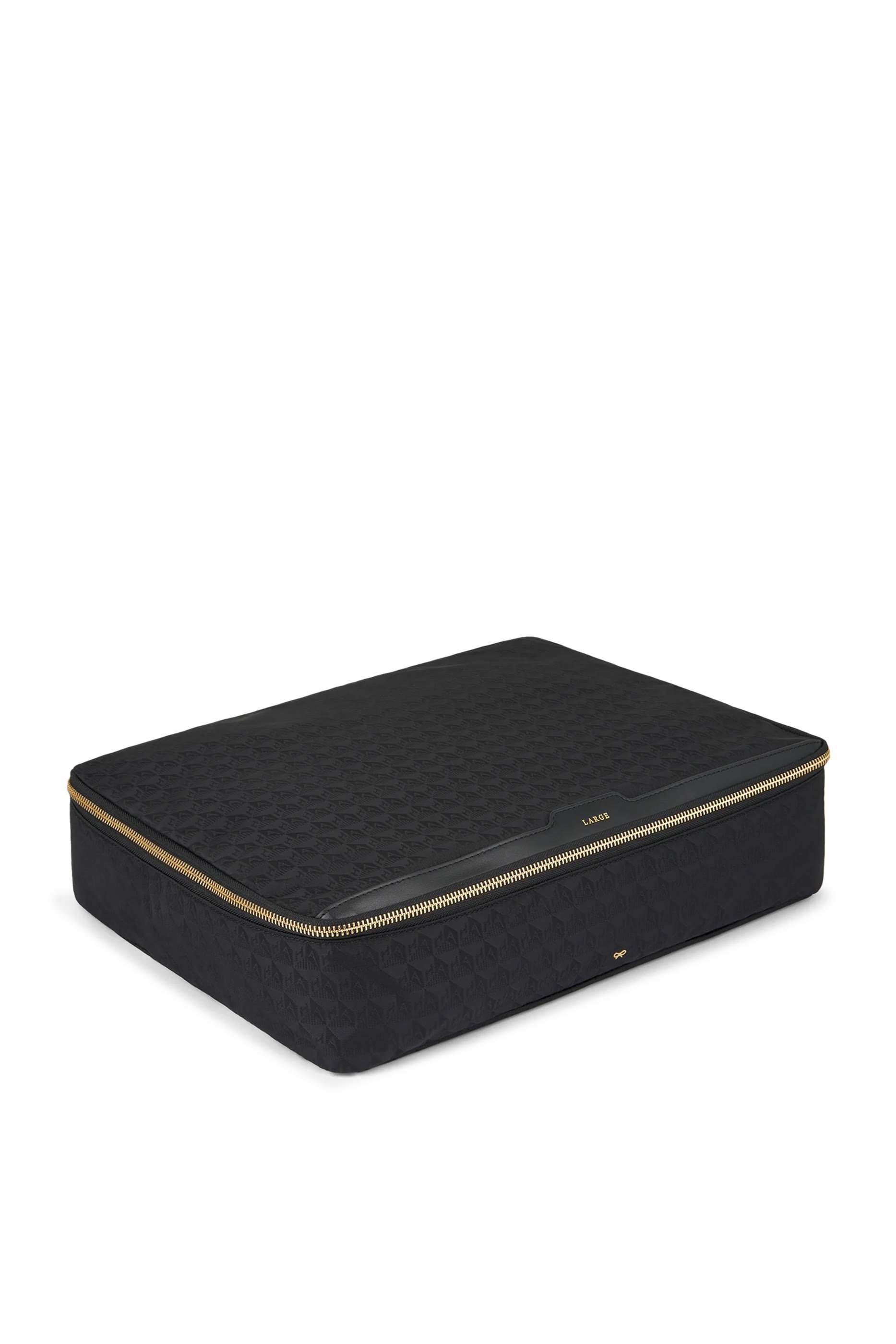 حقيبة تنظيم كبيرة للسفر بشعار الماركة