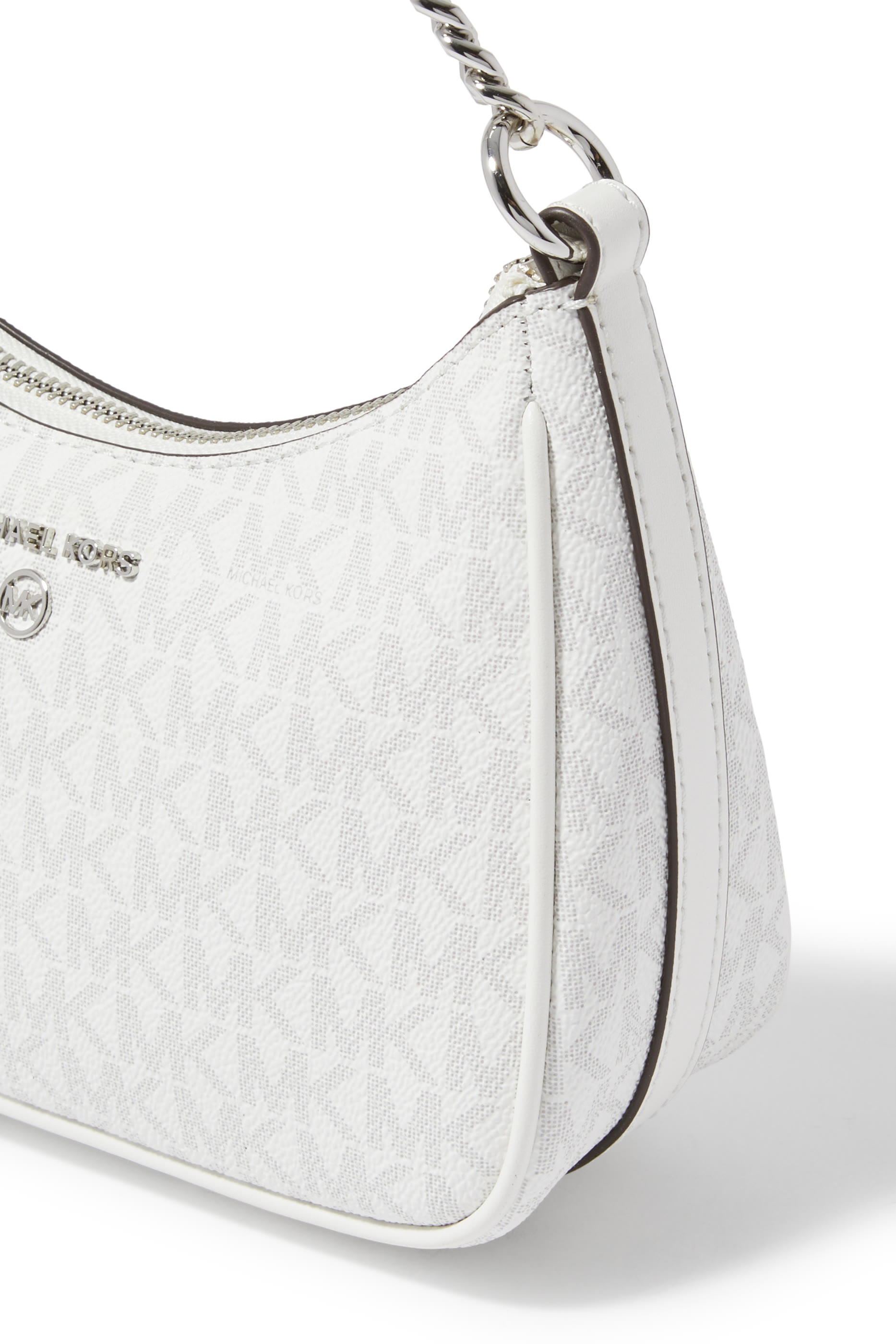 حقيبة جت ست صغيرة بحلية شعار الماركة