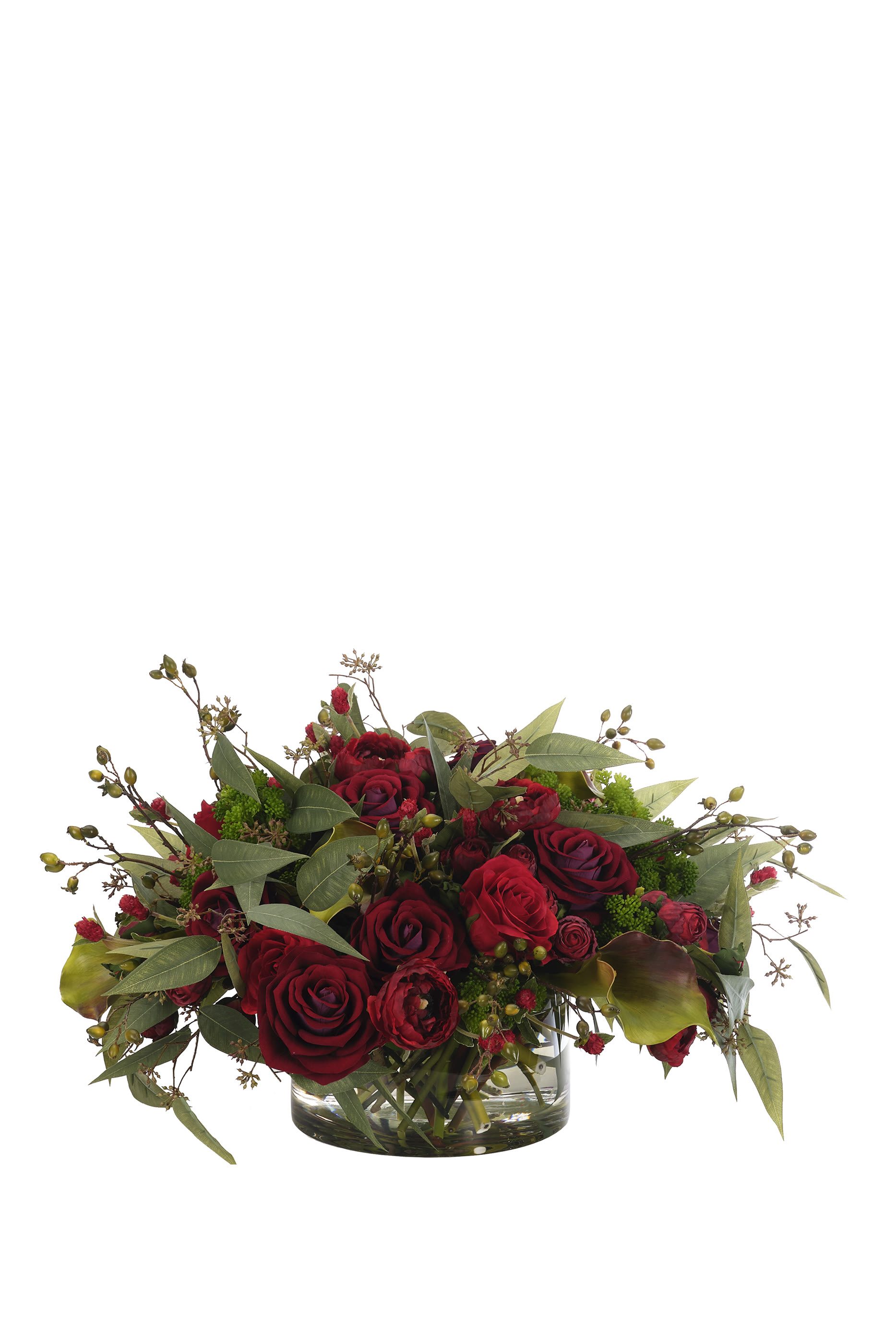 باقة زهور وزنبق في مزهرية زجاجية