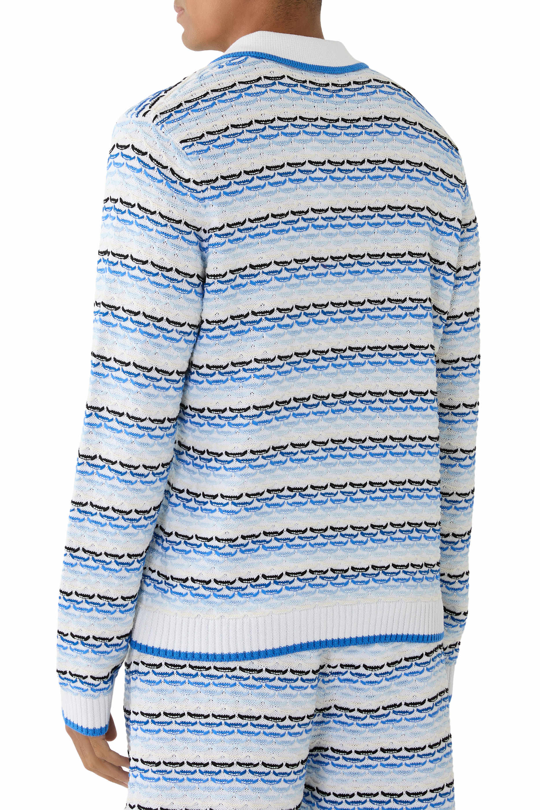 قميص بولو بأكمام طويلة بغرزة مطوية