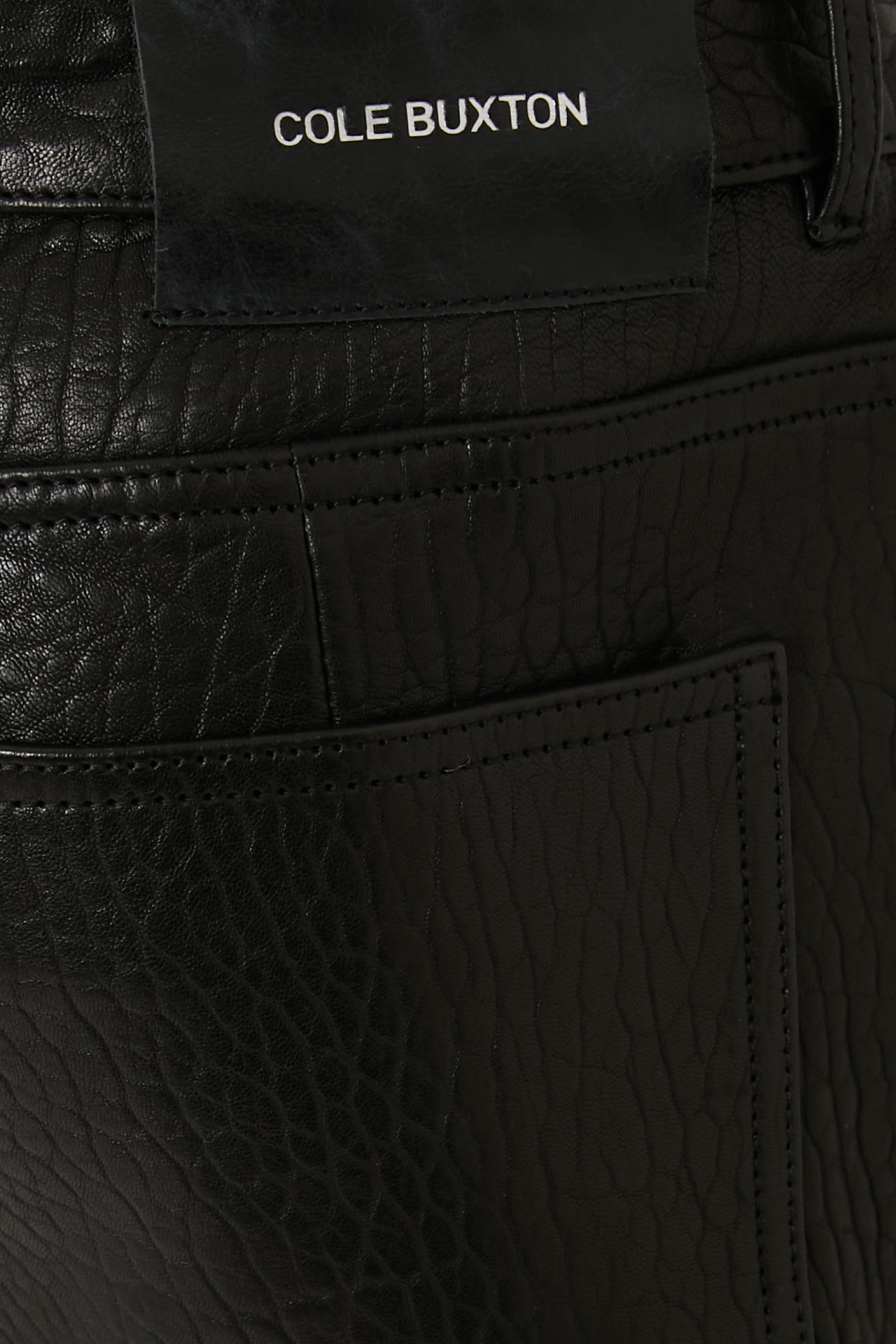 بنطال جينز جلد حمل بلمسة مجعدة