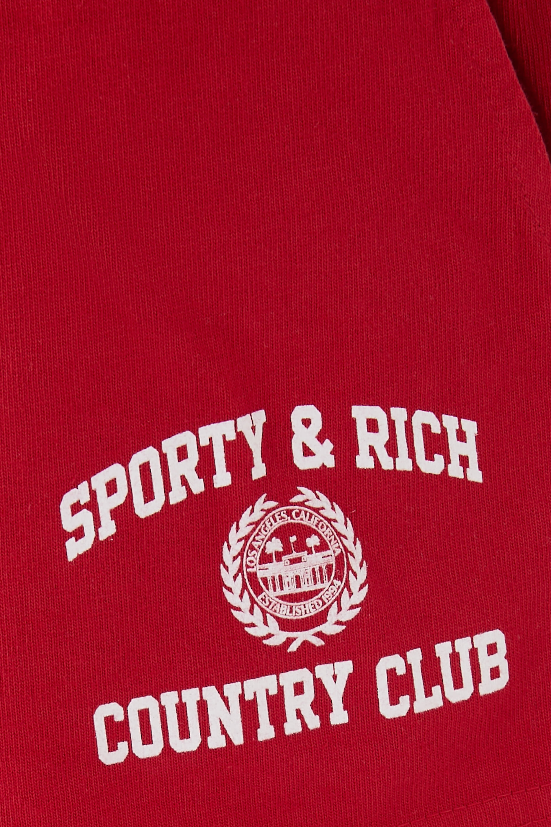 شورت ديسكو بنقشة شعار الماركة بتصميم جامعي