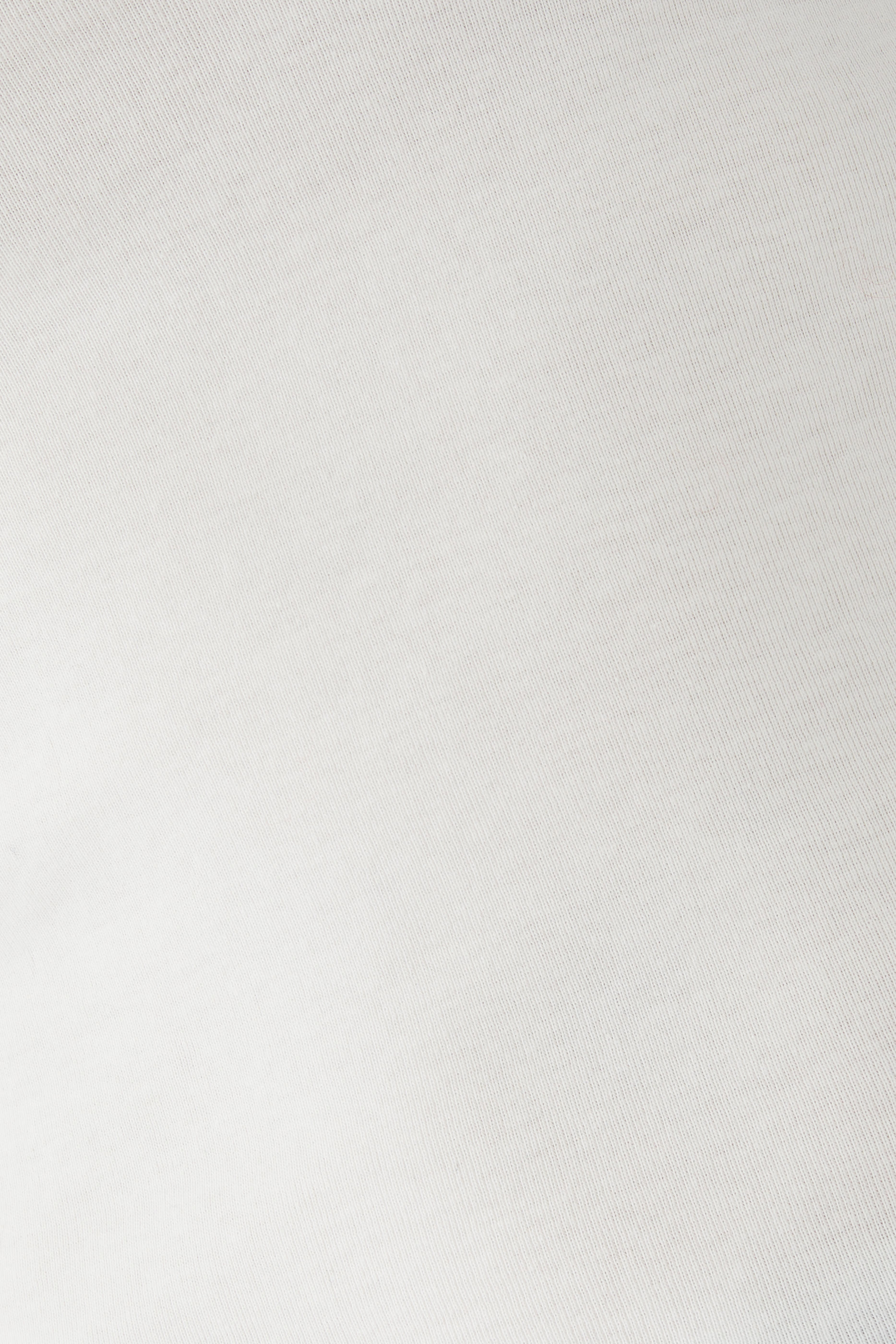 بلوزة بياقة عميقة وقصة ضيقة قطن عضوي