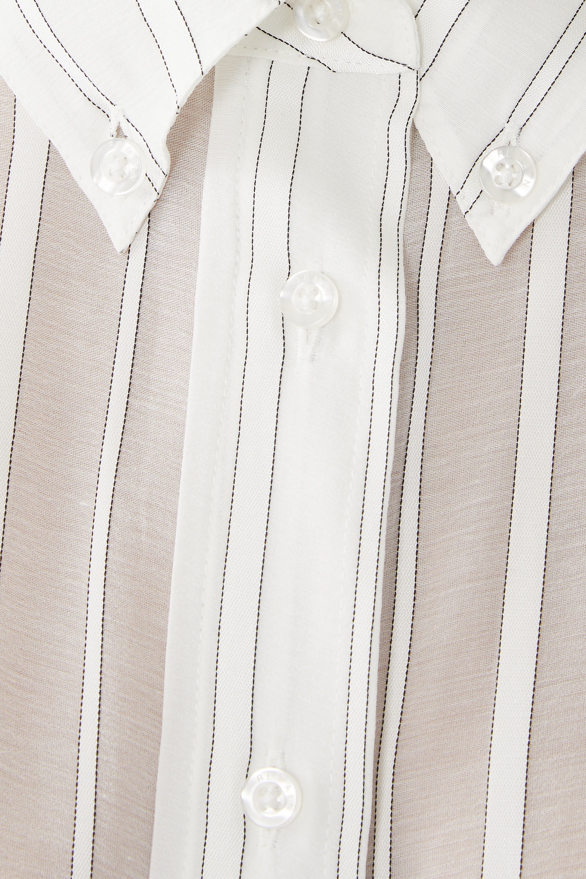 قميص بقصة فضفاضة