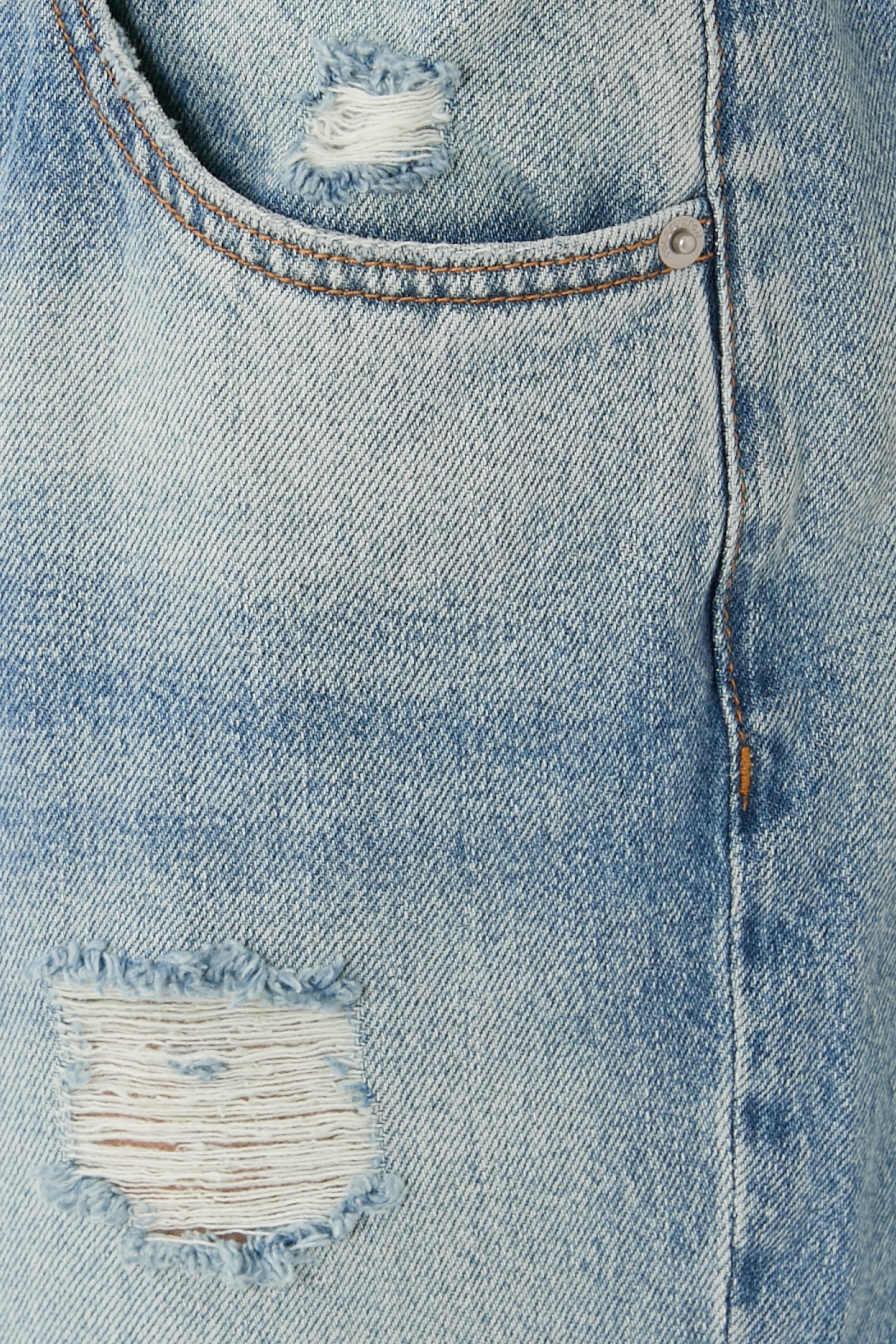 بنطال جينز بتفاصيل ممزقة دنيم