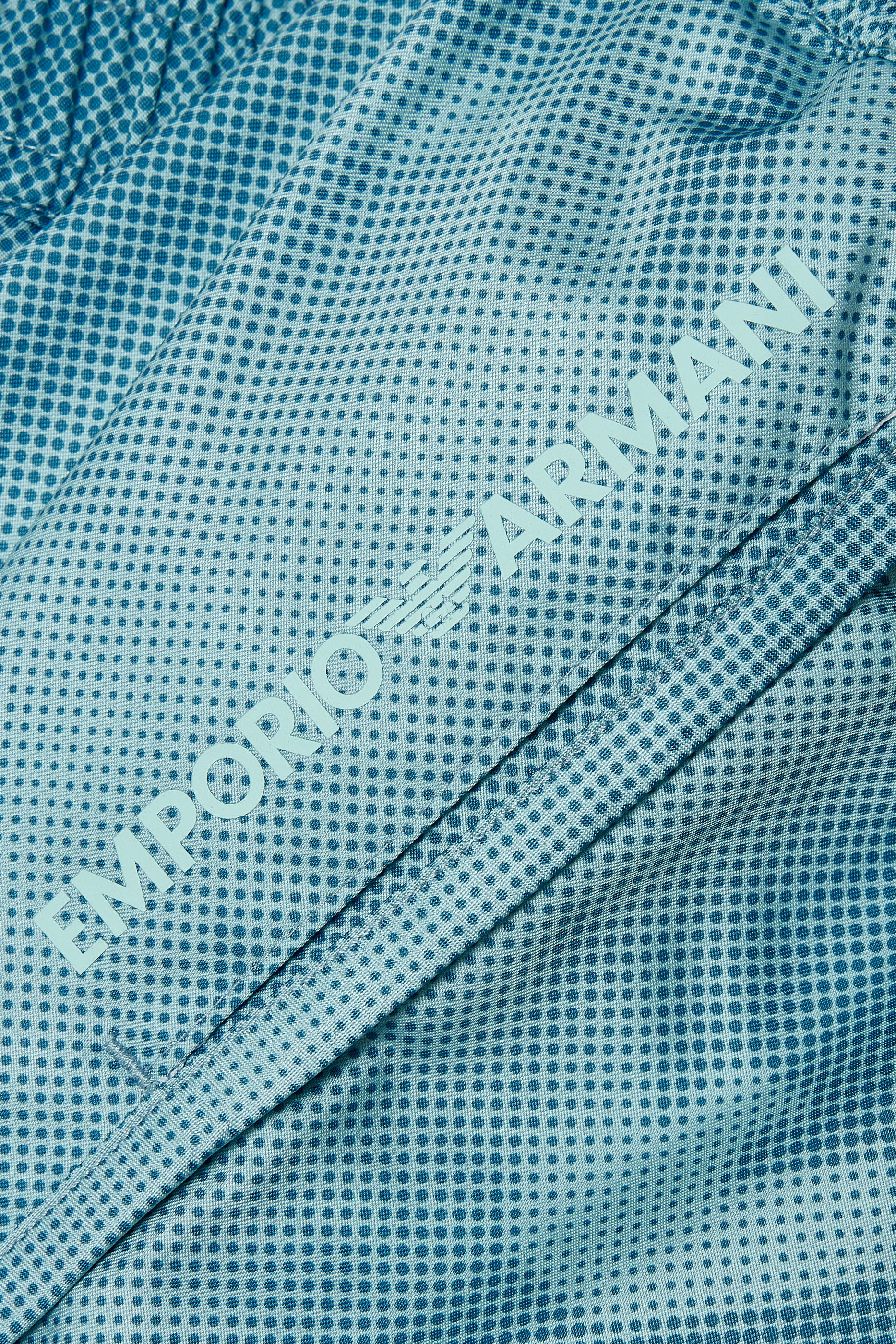 شورت سباحة بشعار الماركة للأطفال