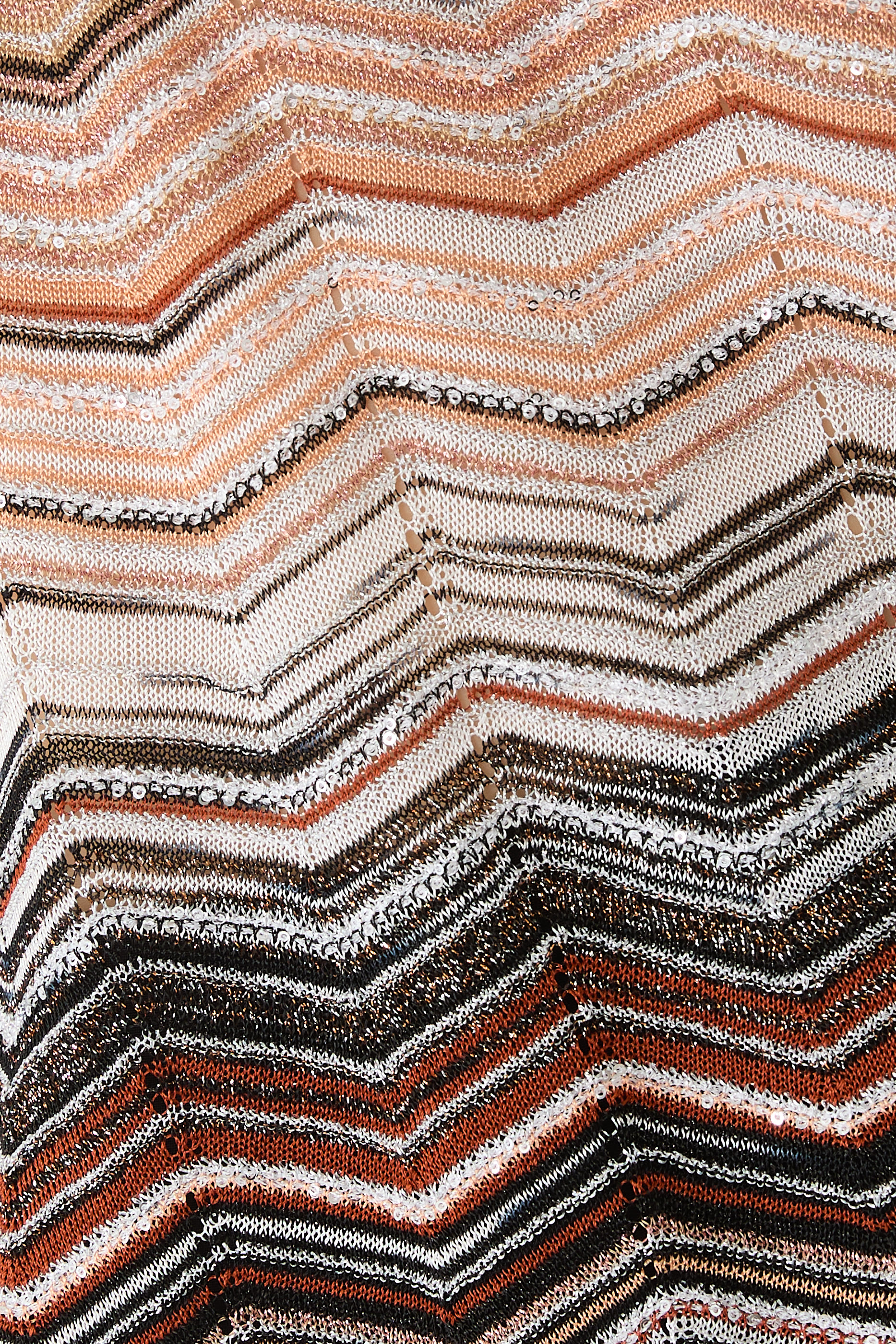 بلوزة بنقشة خطوط متعرجة وترتر لوركس