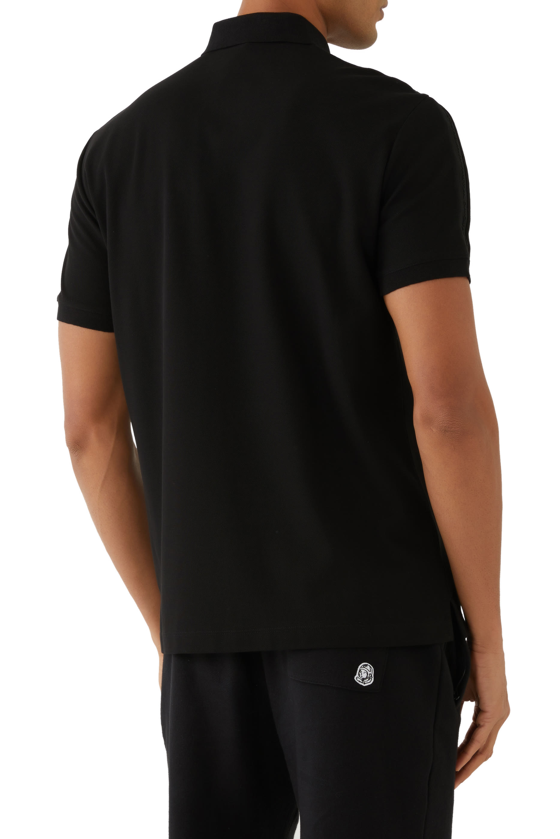 قميص بولو بشريط مطرز بشعار الماركة