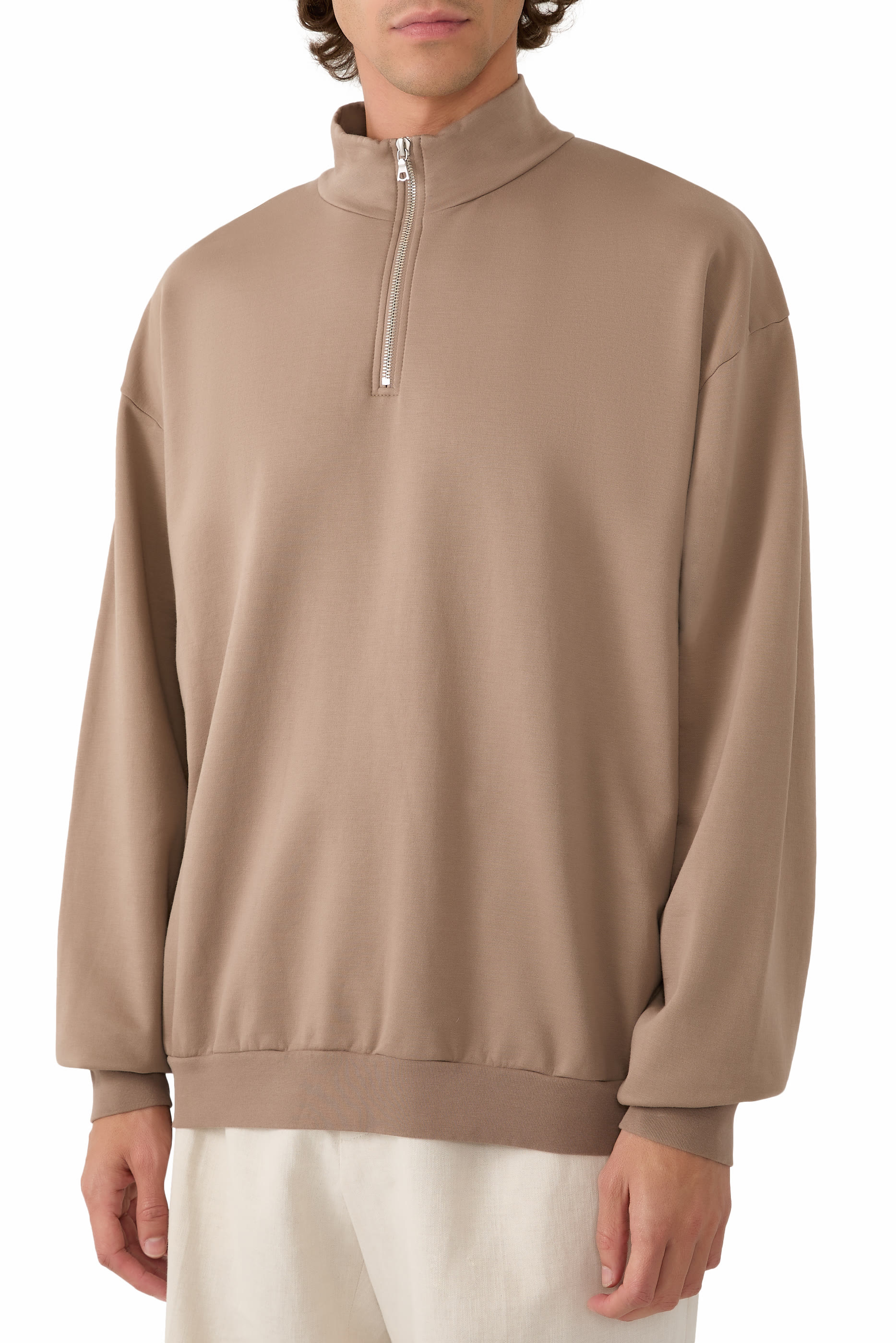 سترة بولو بنصف سحاب وياقة عالية قماش سميك مطاطي