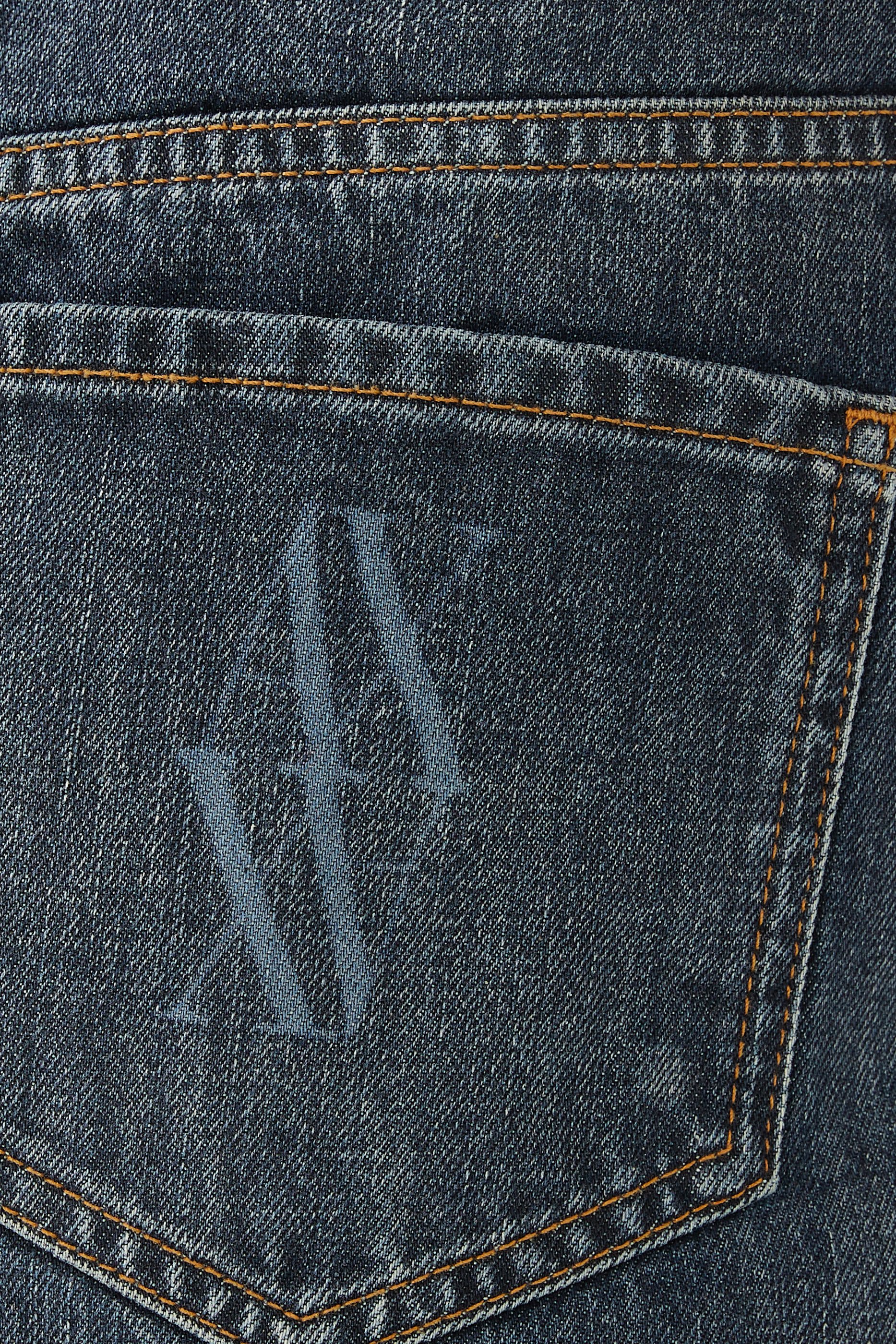 بنطال ميلانو بقصة ساق واسعة