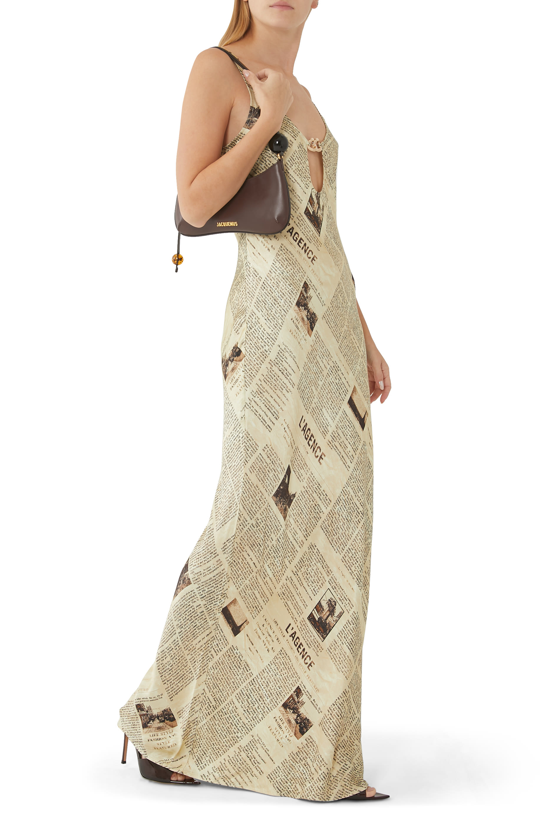 فستان ياسمين بفتحات ونقشة جرائد