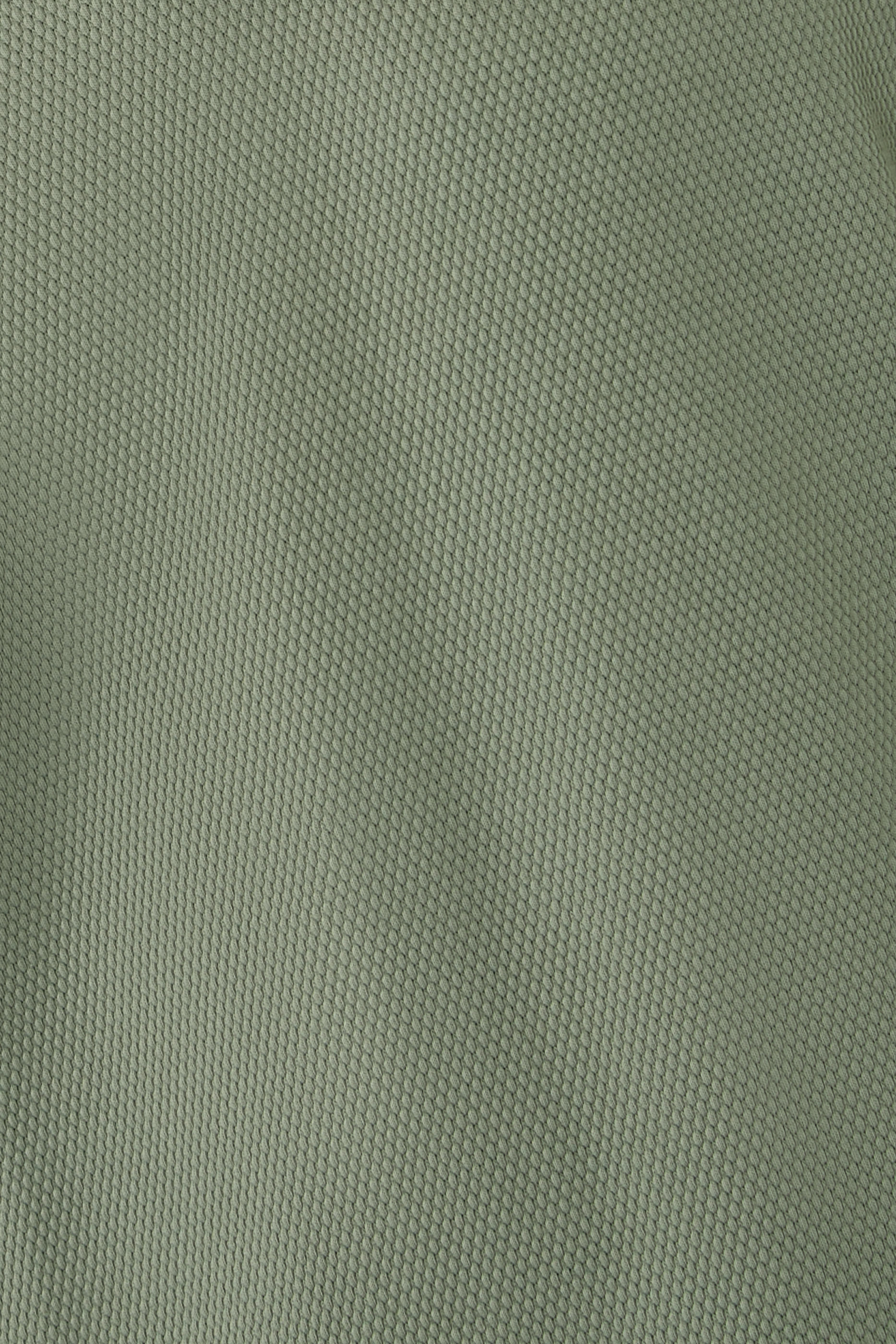 قميص بولو منسوج بياقة مفتوحة