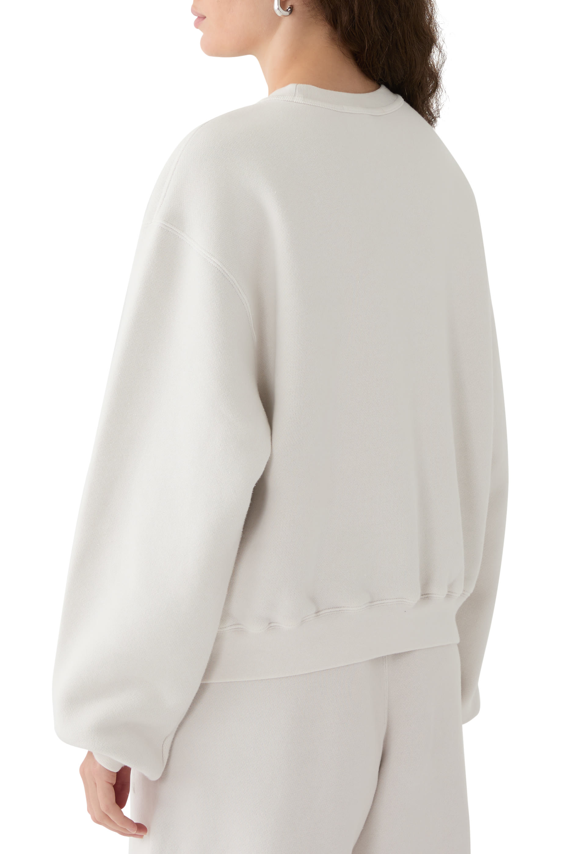 سويت شيرت بشعار الماركة بتصميم ممزق