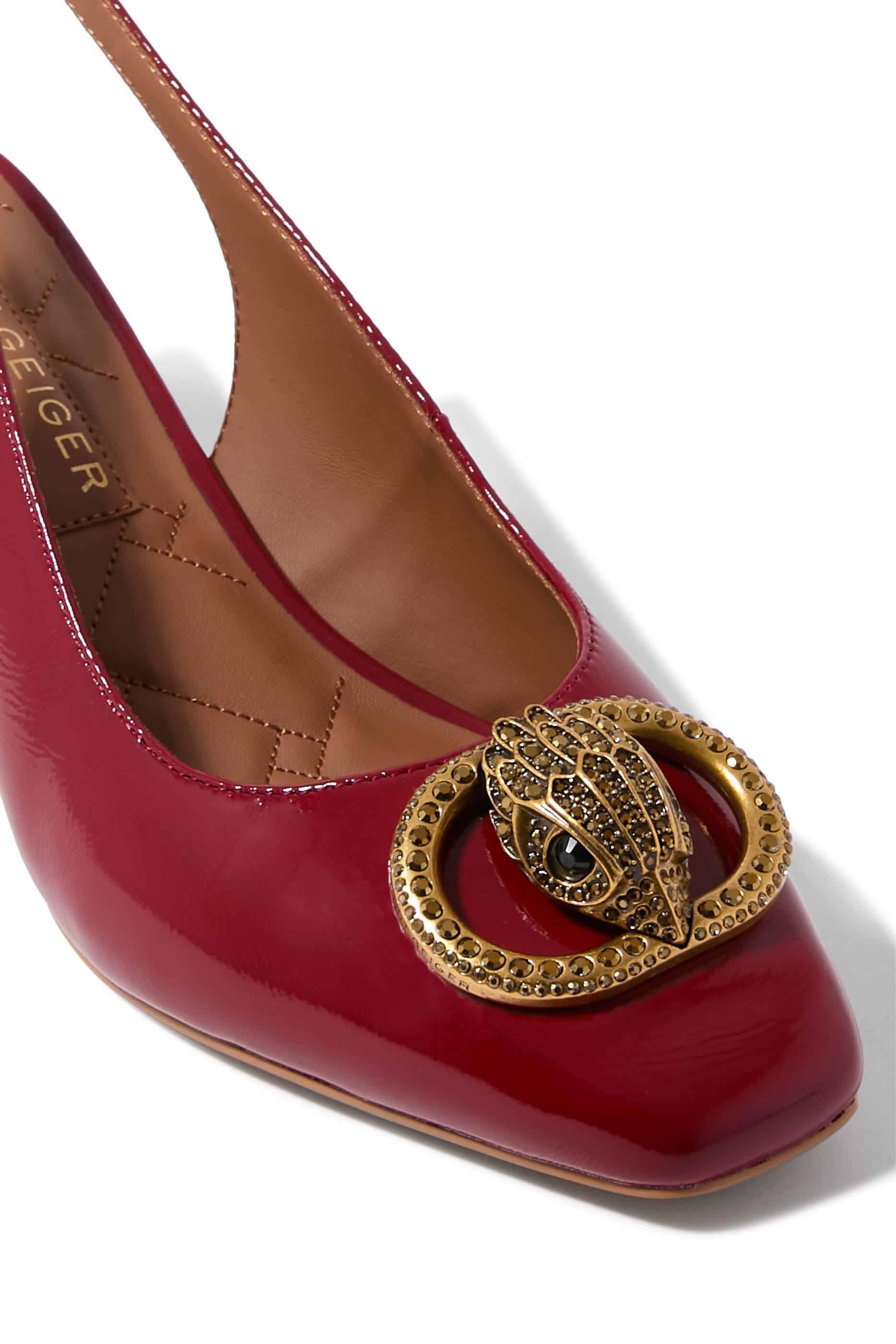 حذاء تشيلسيا بكعب عريض وسير خلفي