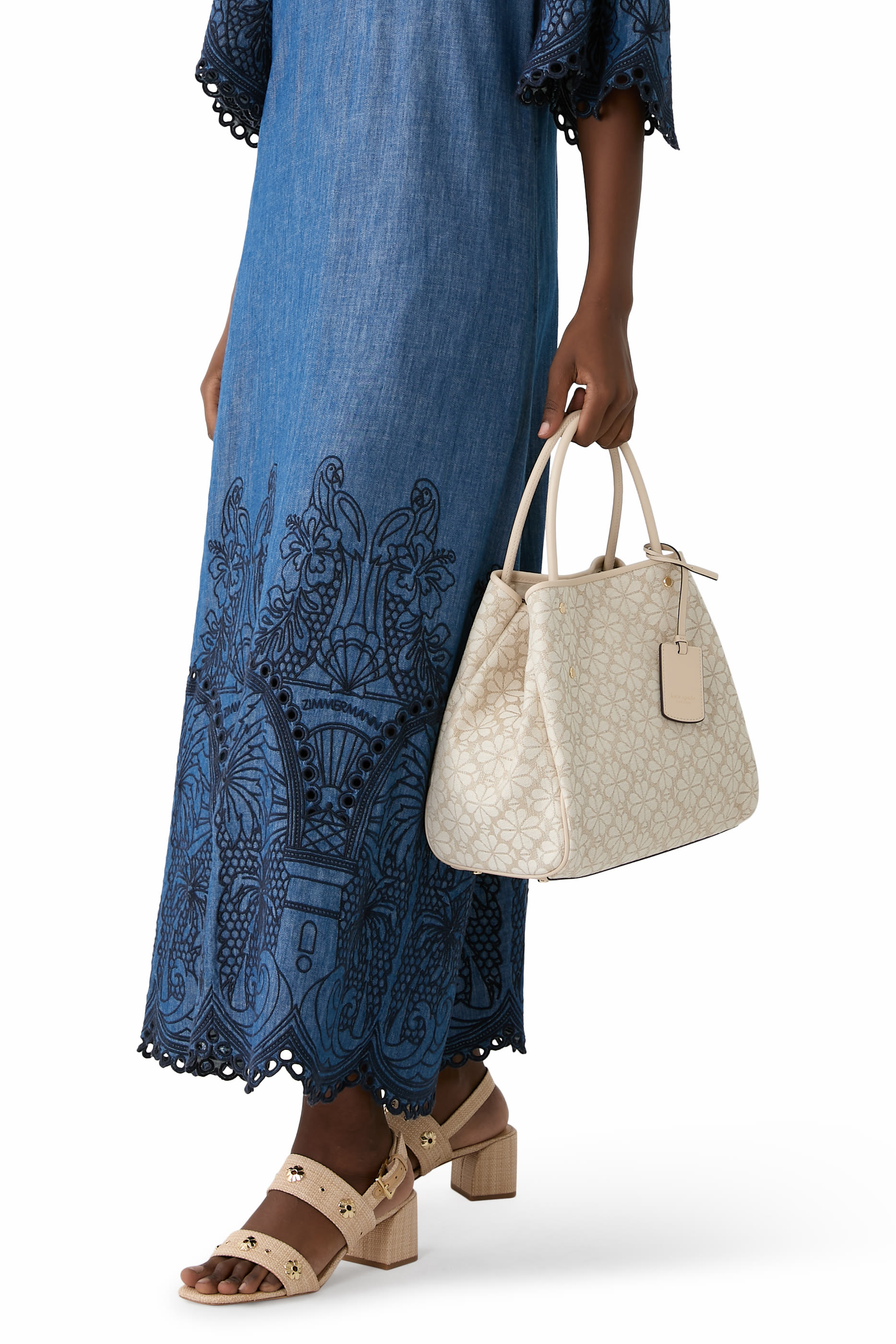 حقيبة يد متوسطة بنقشة زهور بالشكل البستوني