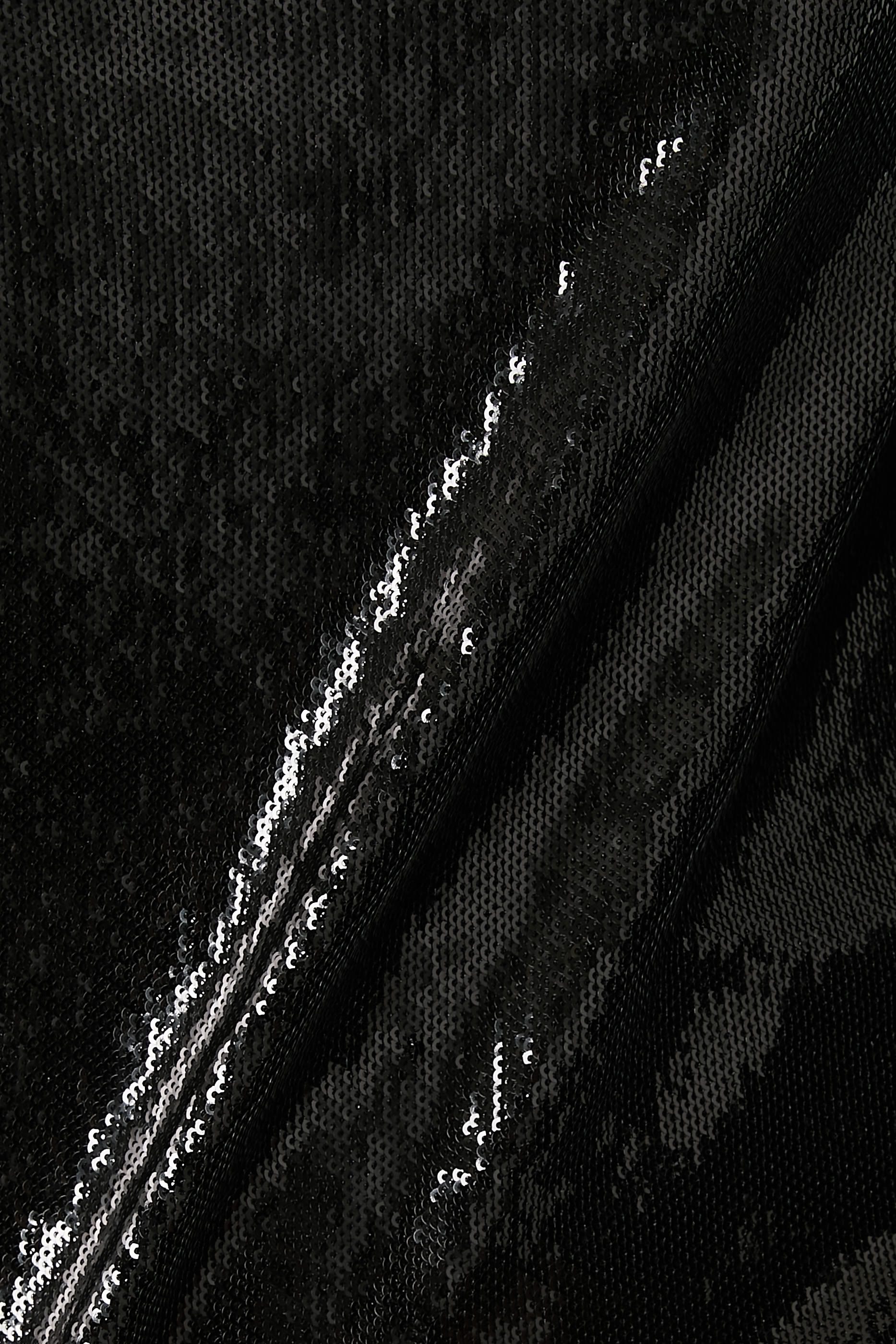 بلوزة مطرزة بترتر