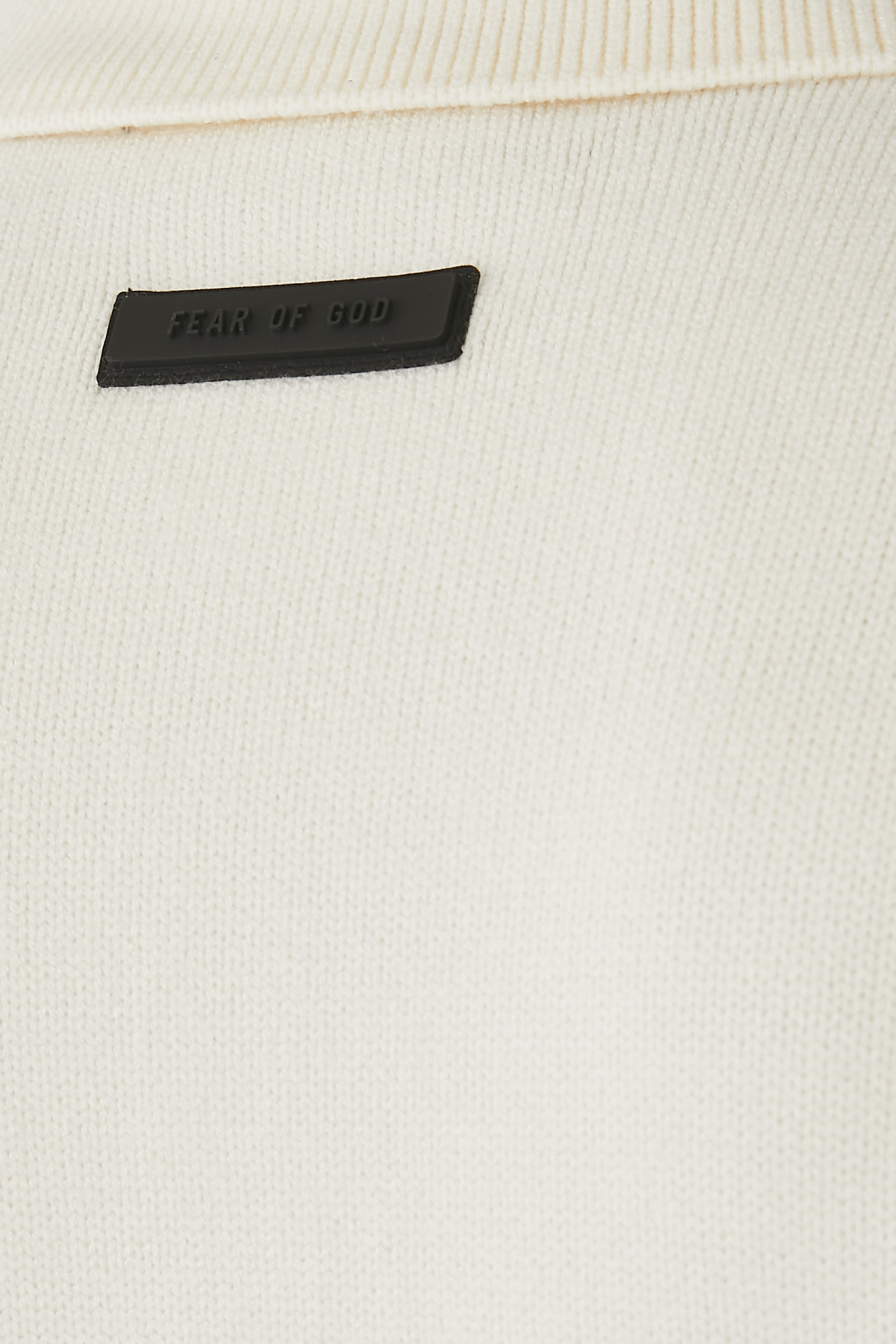 كنزة بولو منسوجة بشعار اسنشالز