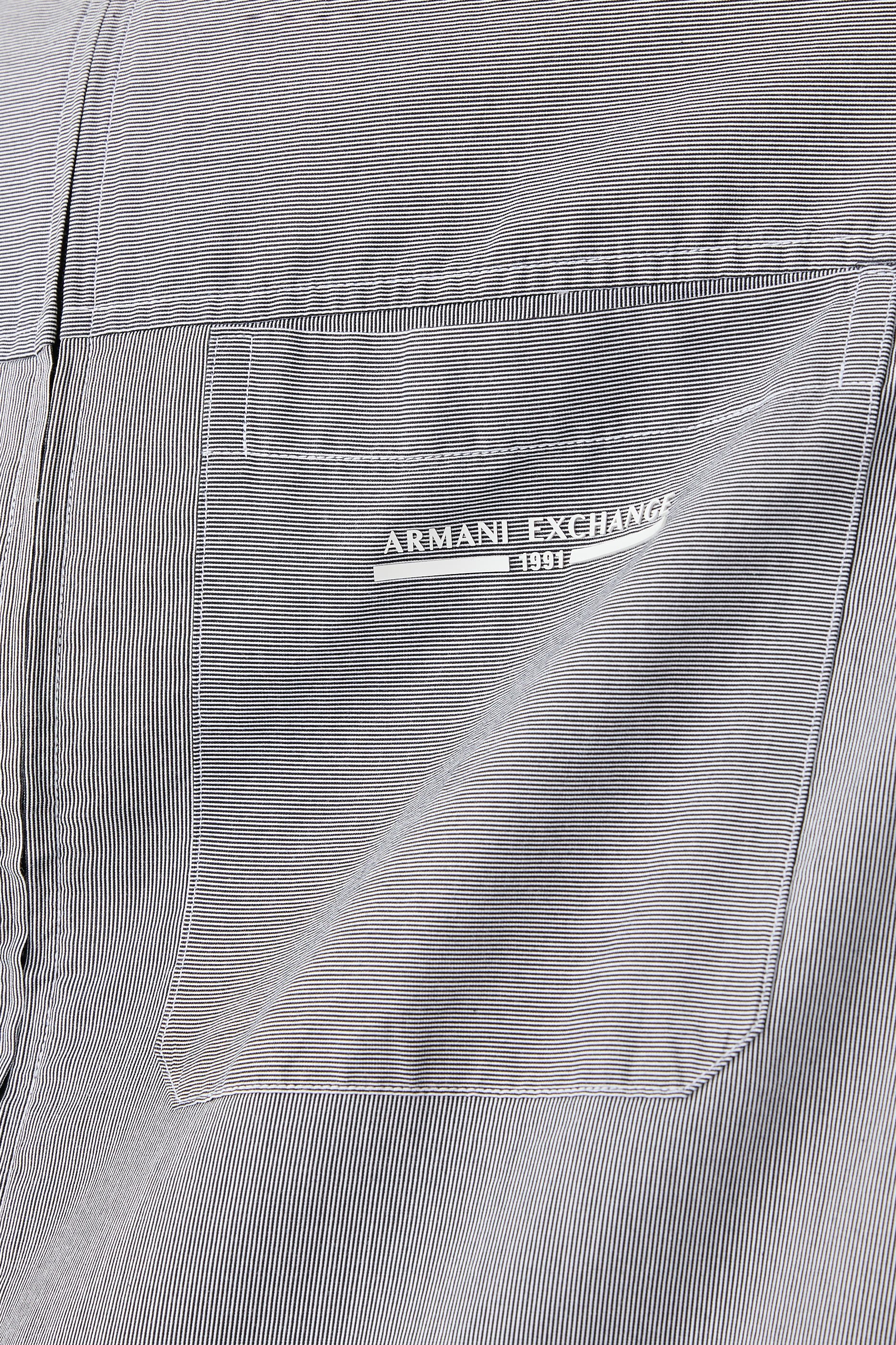 قميص بسحاب كامل وجيب