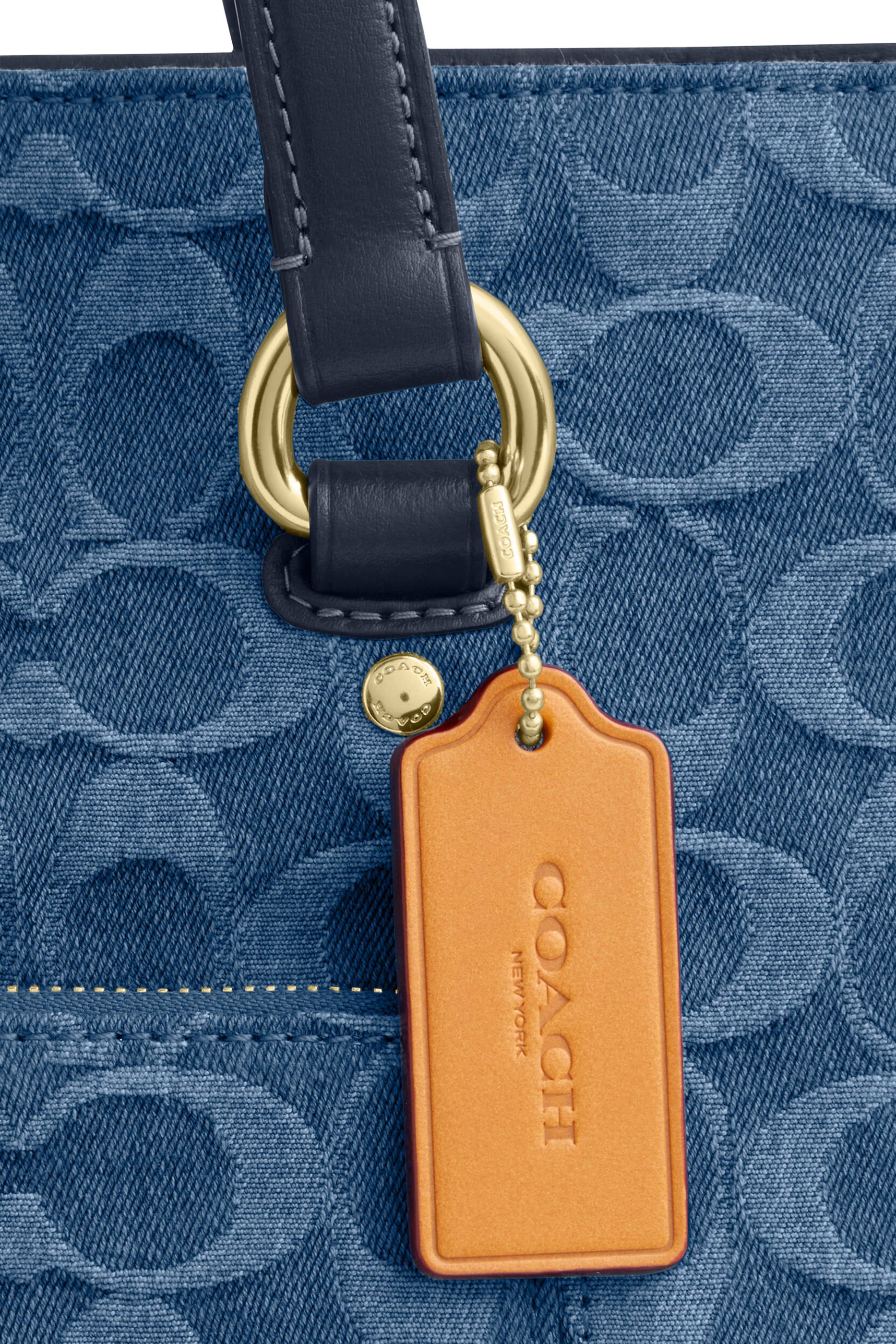 حقيبة يد ستيشن دنيم بشعار الماركة