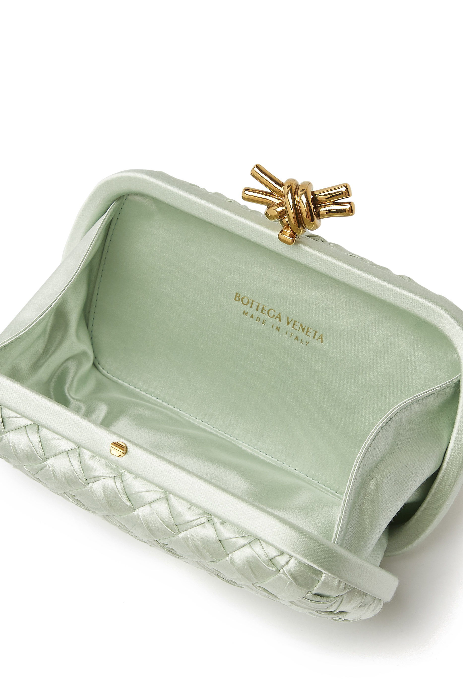 كلاتش نوت جلد عجل بتصميم مجدول